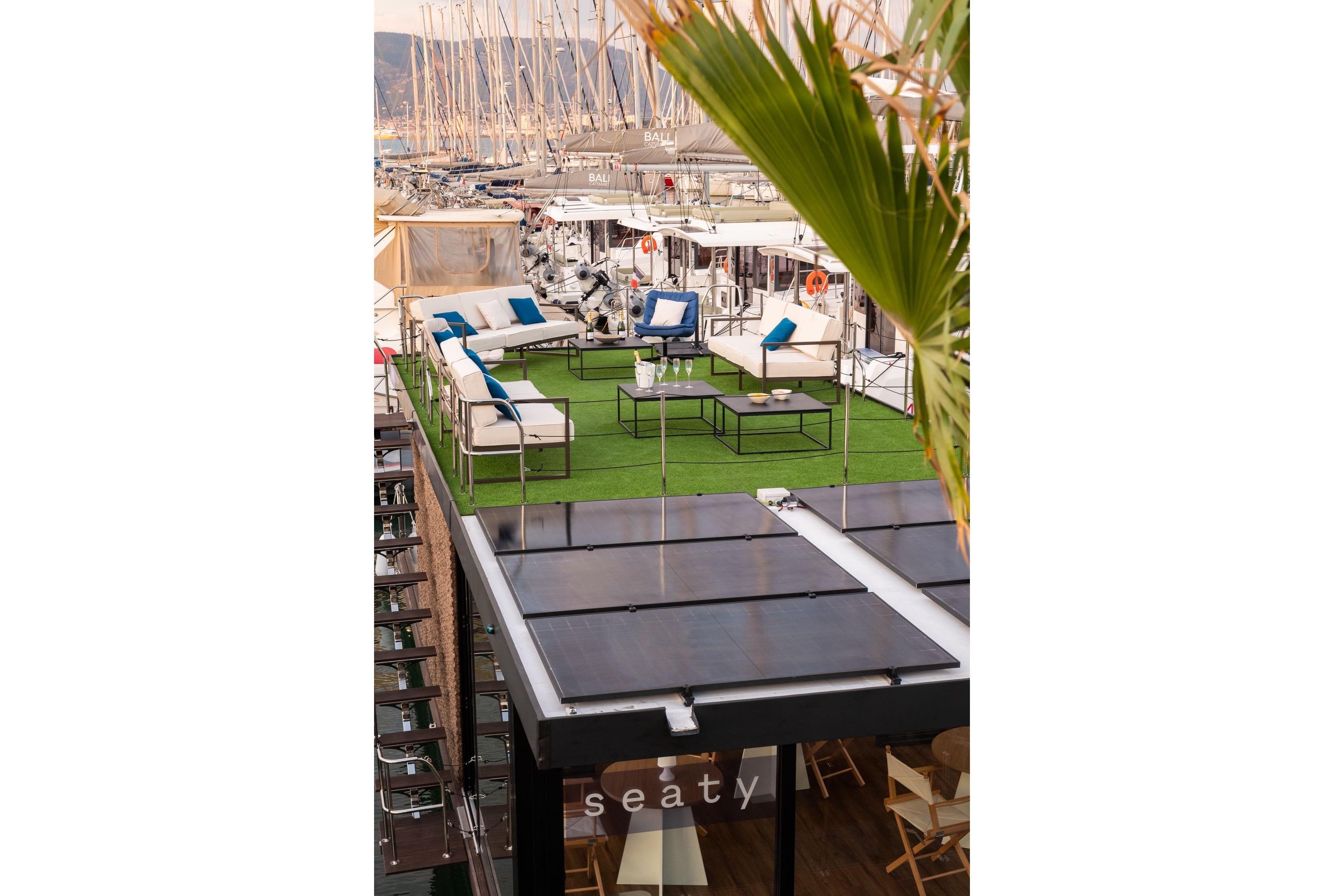 Rooftop lounge on a SEATY OFFICE boat, featuring modern outdoor furniture, 2026 model.