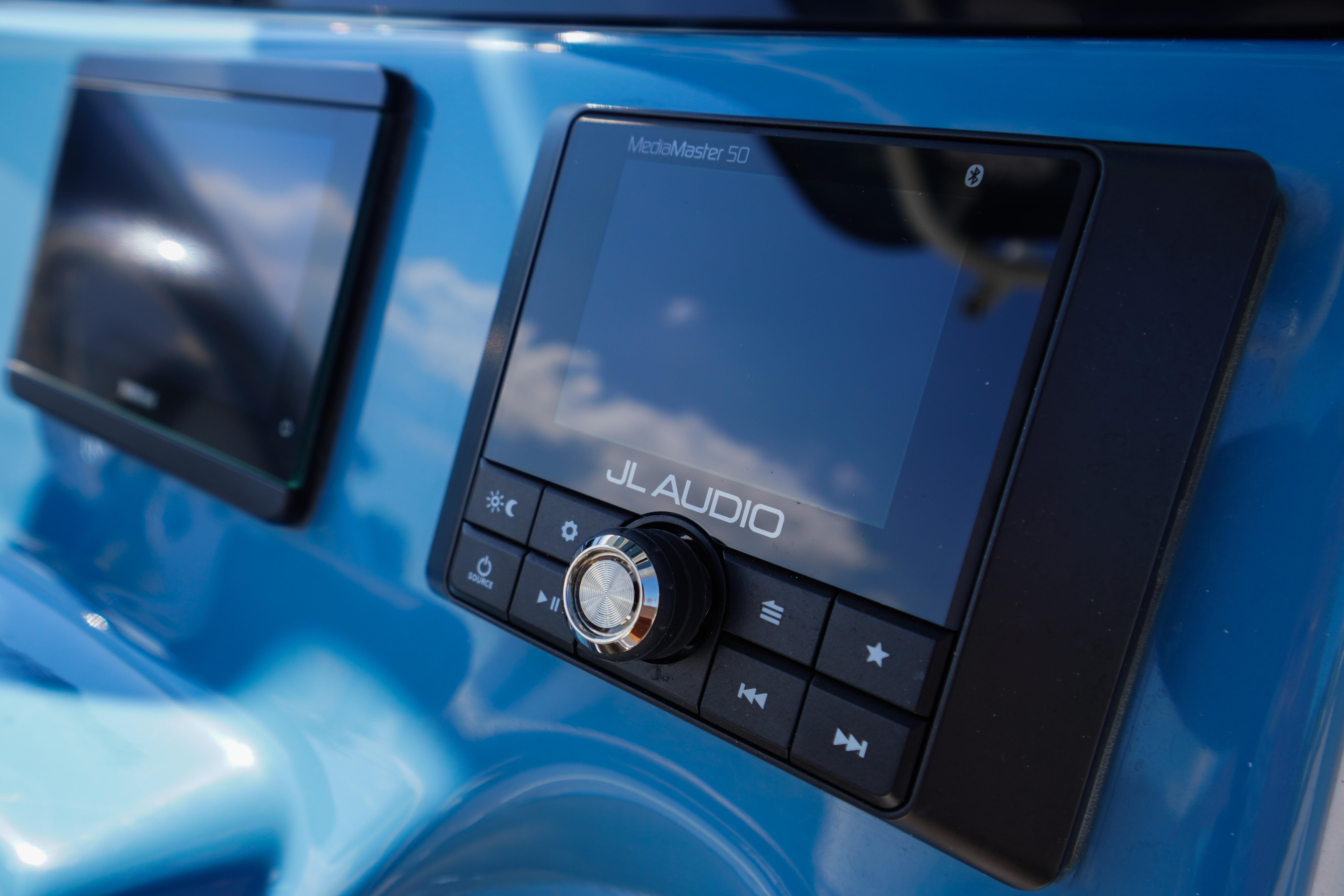 Close-up of JL Audio system on 2025 Tidewater 232 SS boat dashboard.