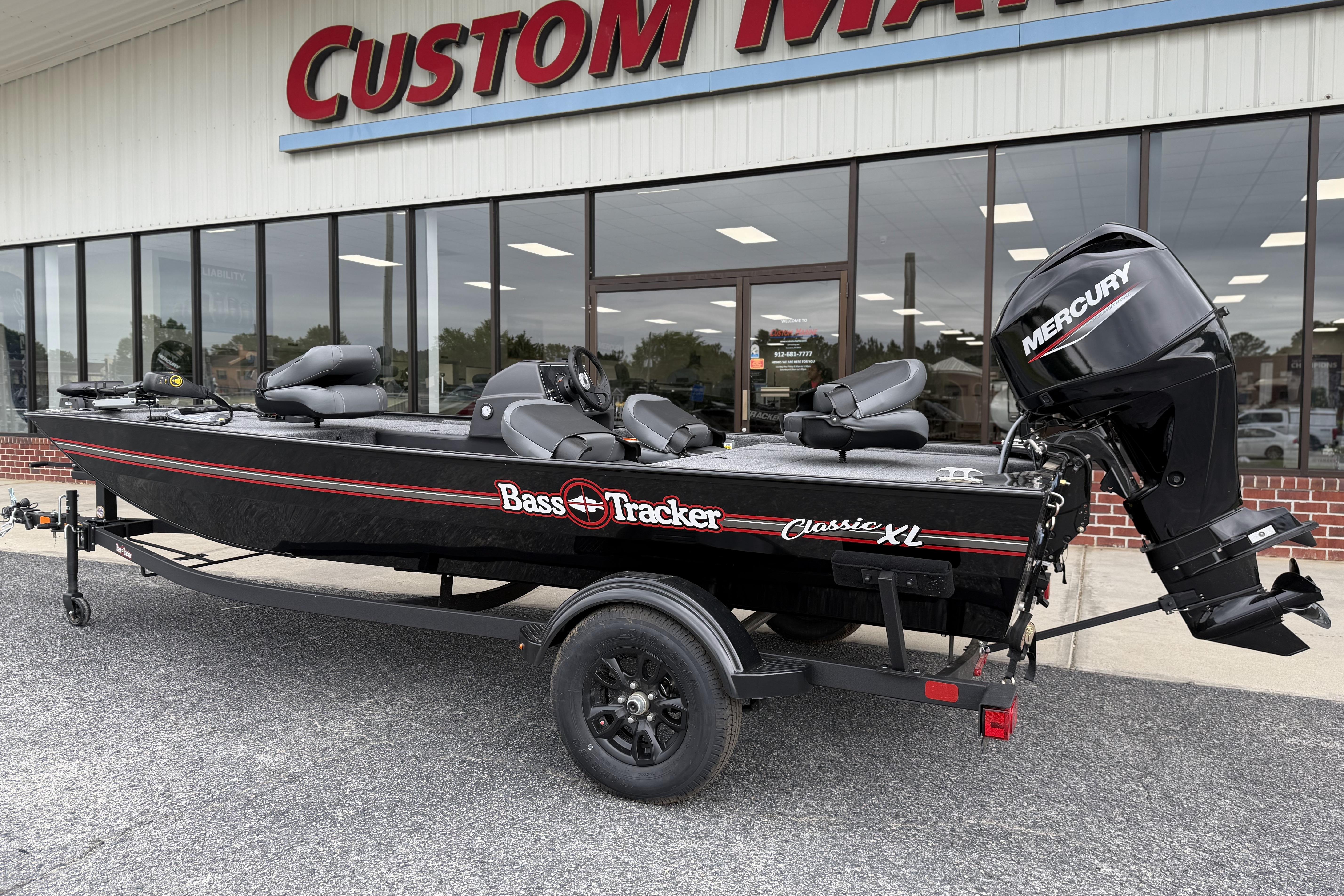 2026 Tracker Bass Tracker Classic XL boat with Mercury engine outside dealership.
