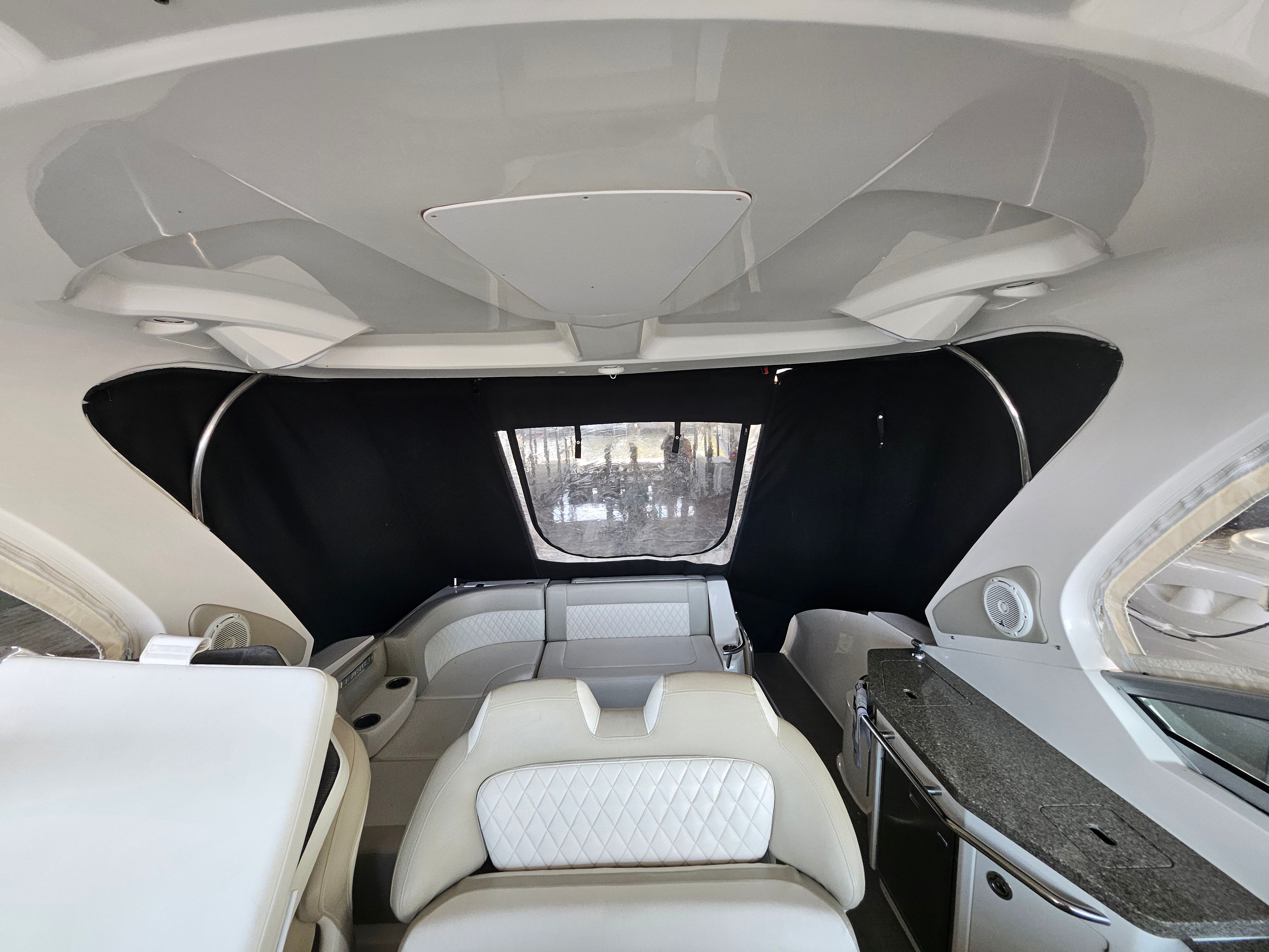 Interior of a 2014 Chaparral 330 Signature yacht with luxurious features.