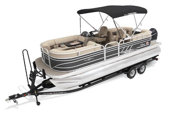 2023 Sun Tracker Party Barge 22 XP3 pontoon boat on trailer with canopy.