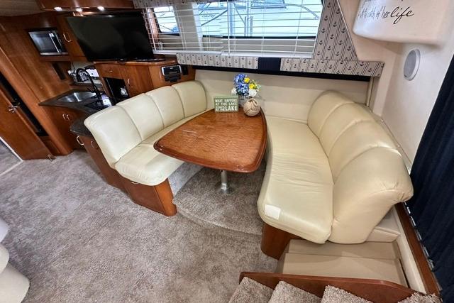 Interior of 2004 Carver 360 Mariner with cozy dining area and modern amenities.