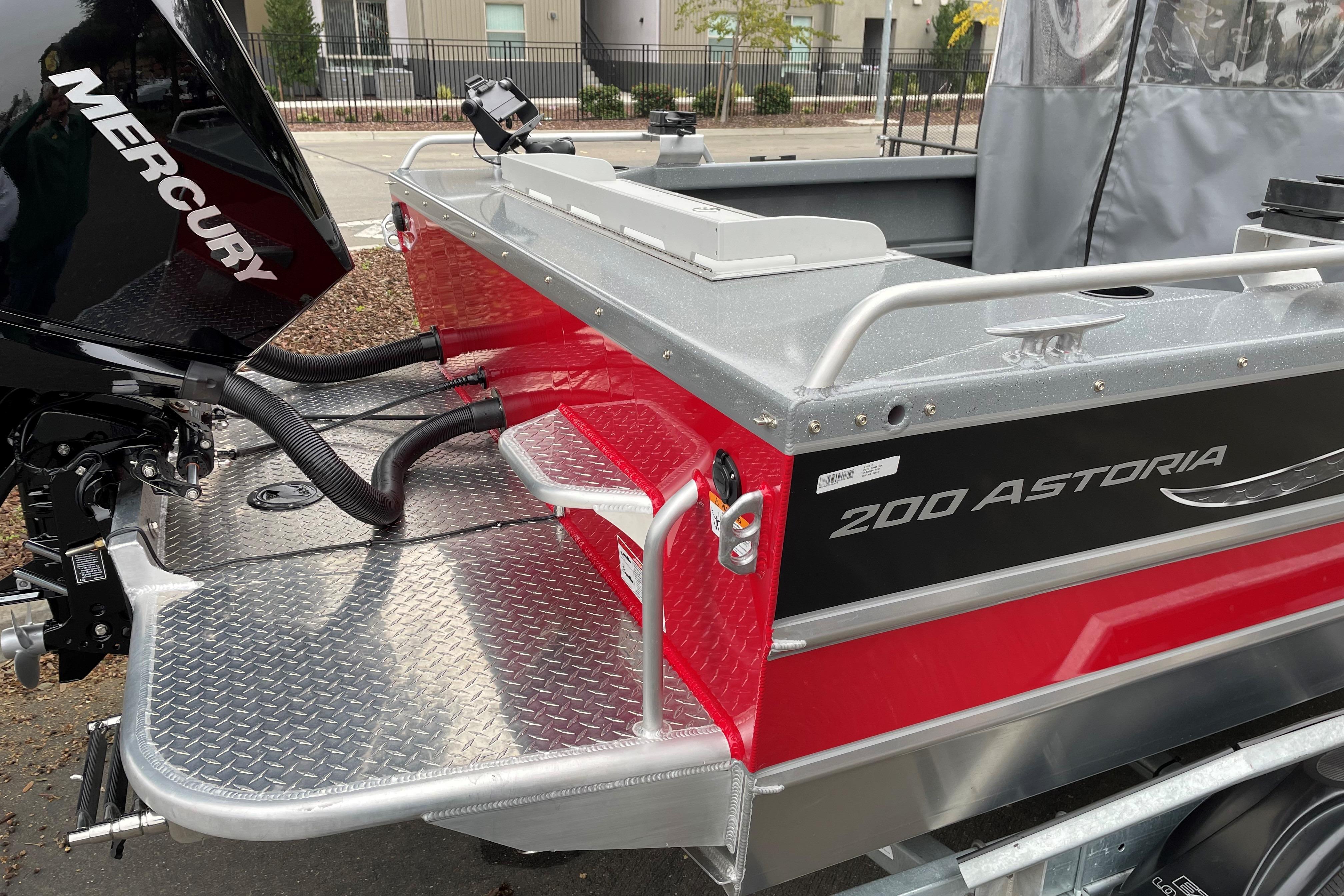 2024 Spartan 200 Astoria boat with Mercury engine, featuring sleek design and durable construction.