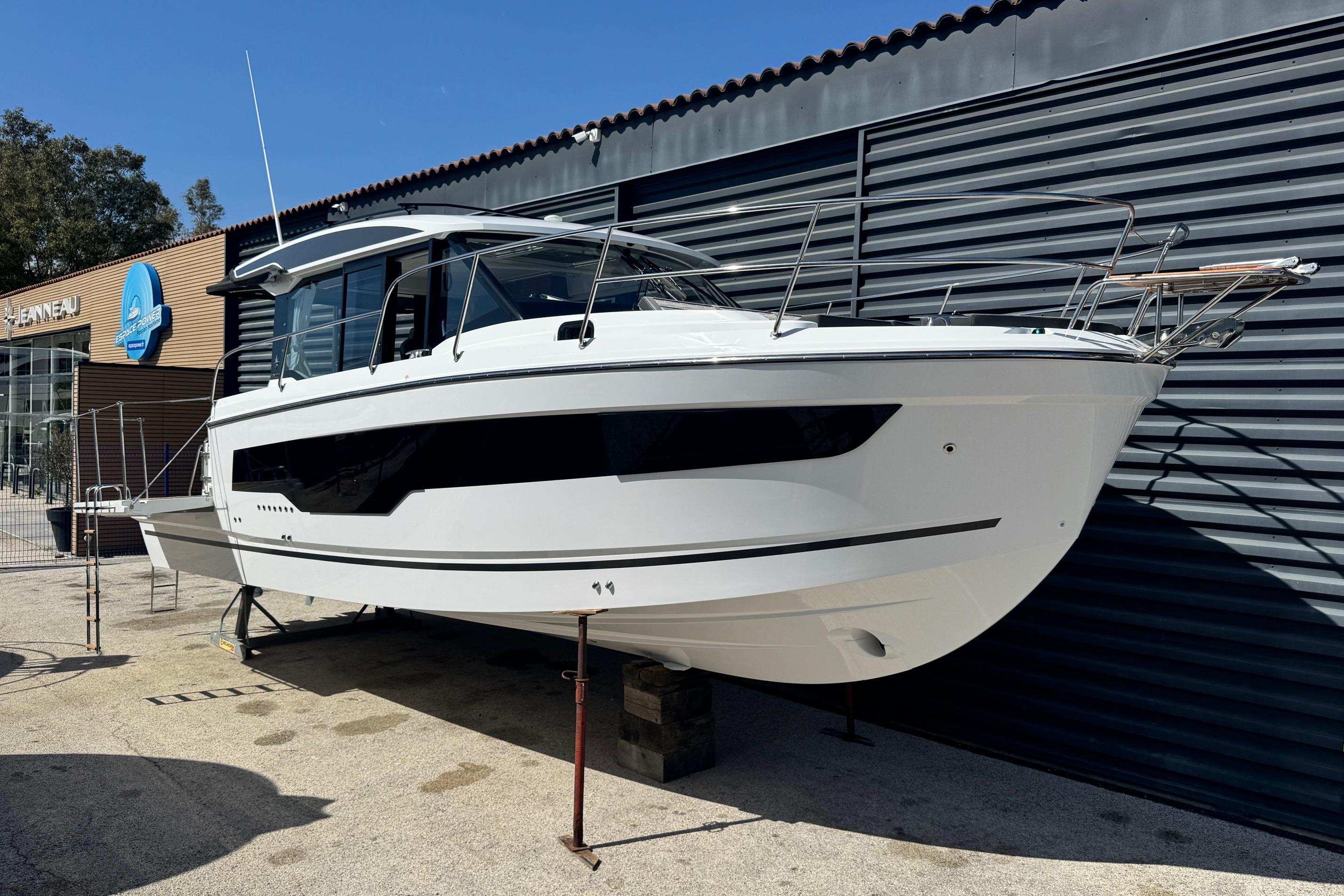 2026 Jeanneau Merry Fisher 1095 boat displayed outdoors, showcasing sleek design and modern features.