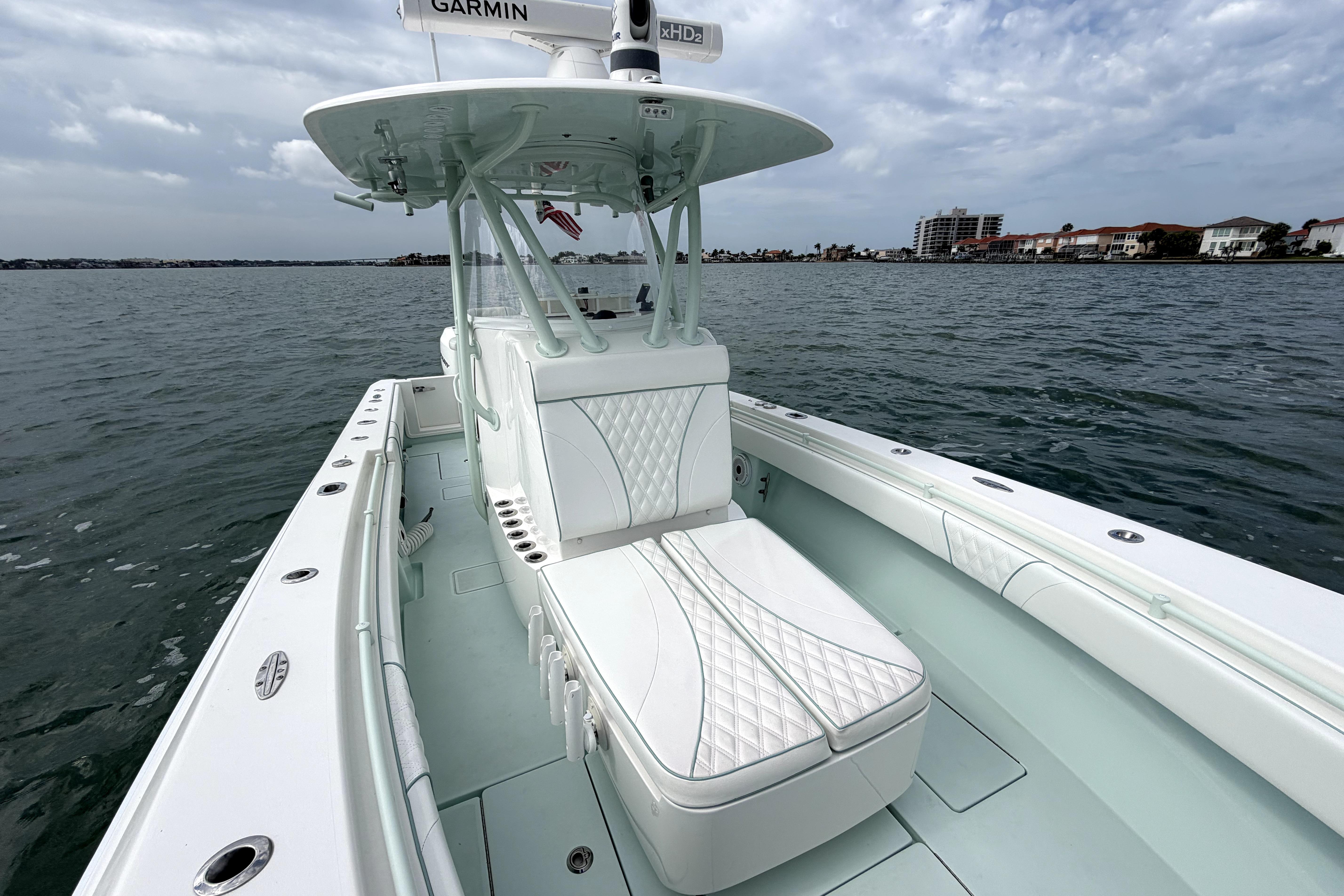 2019 Contender 30 ST boat on water, featuring sleek design and advanced Garmin technology.