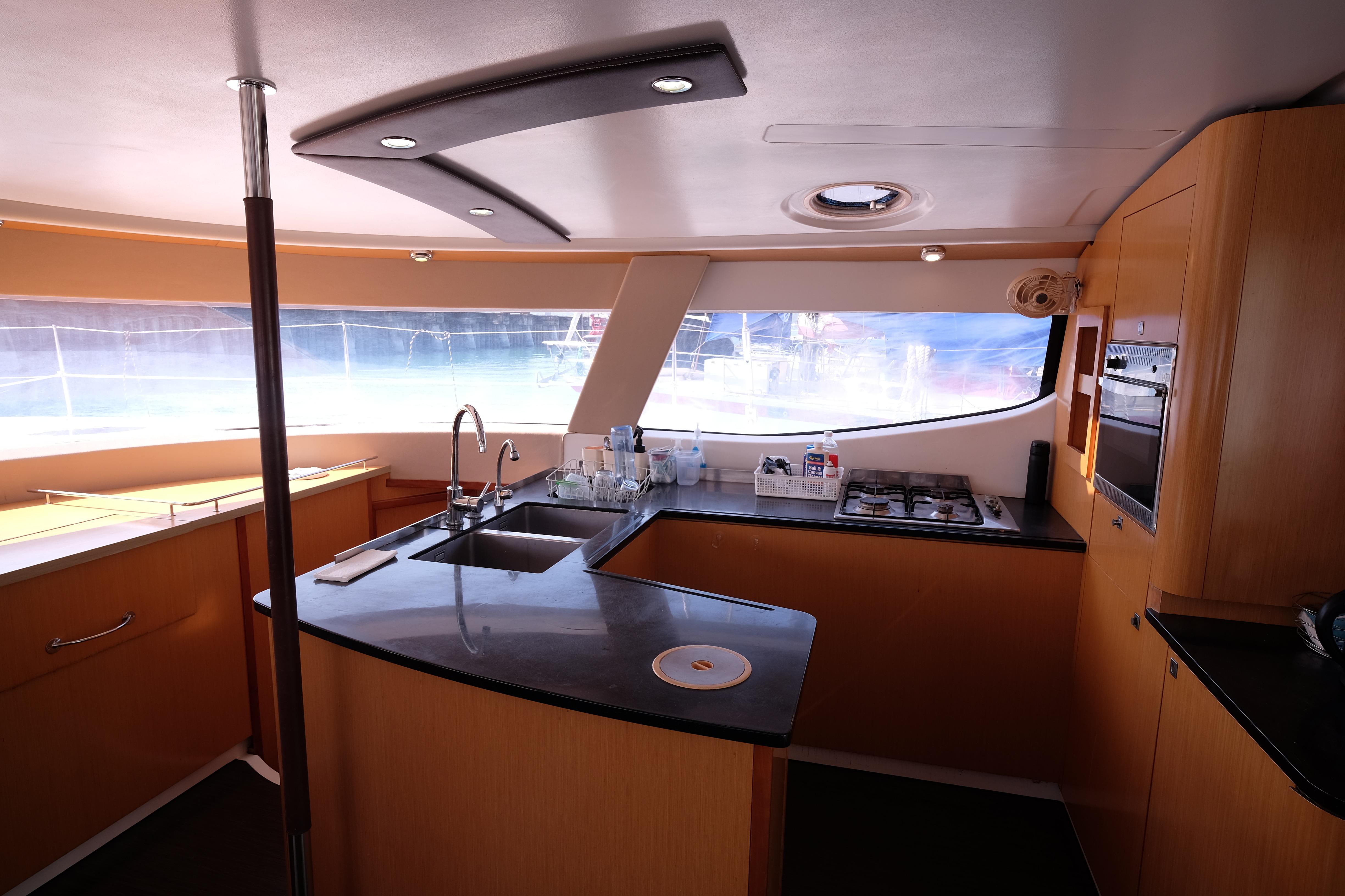 Modern kitchen interior of 2013 Fountaine Pajot Salina 48 Evolution yacht.