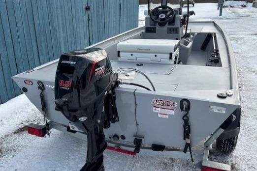 2026 Tracker Bass Tracker Classic CC boat with Mercury outboard motor on snowy ground.
