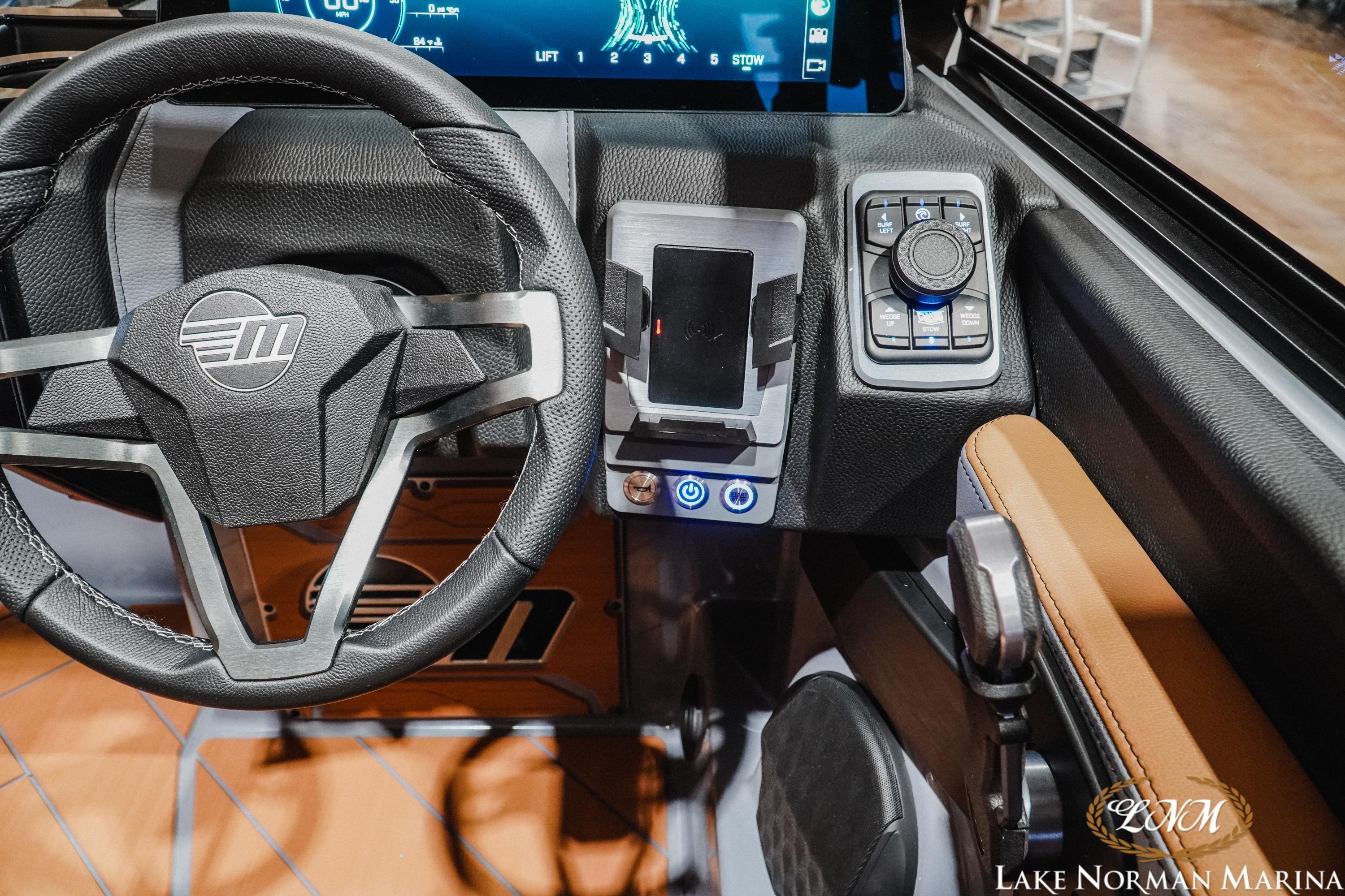 2026 Malibu Wakesetter 23 LSV dashboard with steering wheel and control panel.