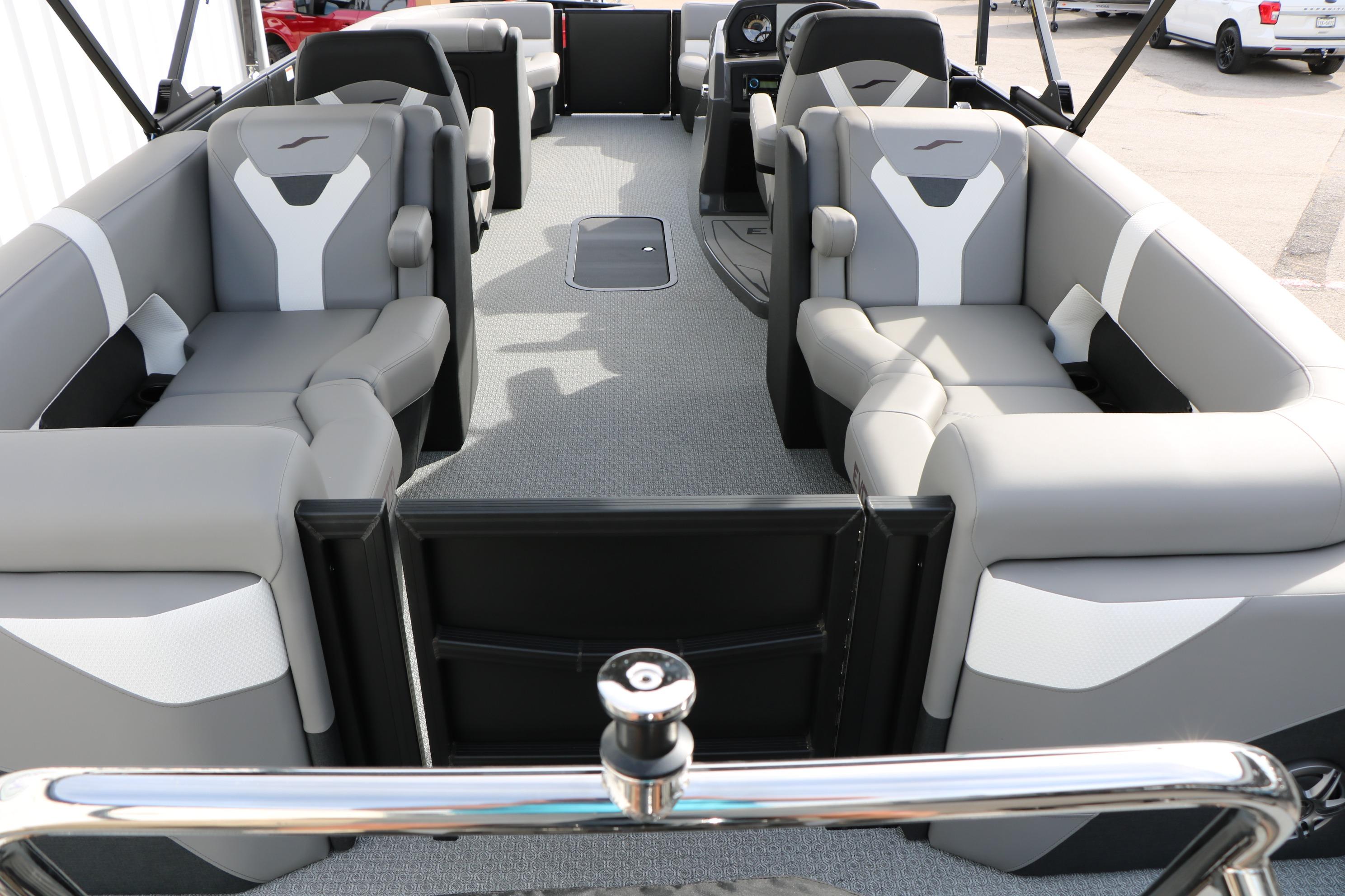 Luxurious interior of 2026 Evotti 521QL boat with modern seating and sleek design.