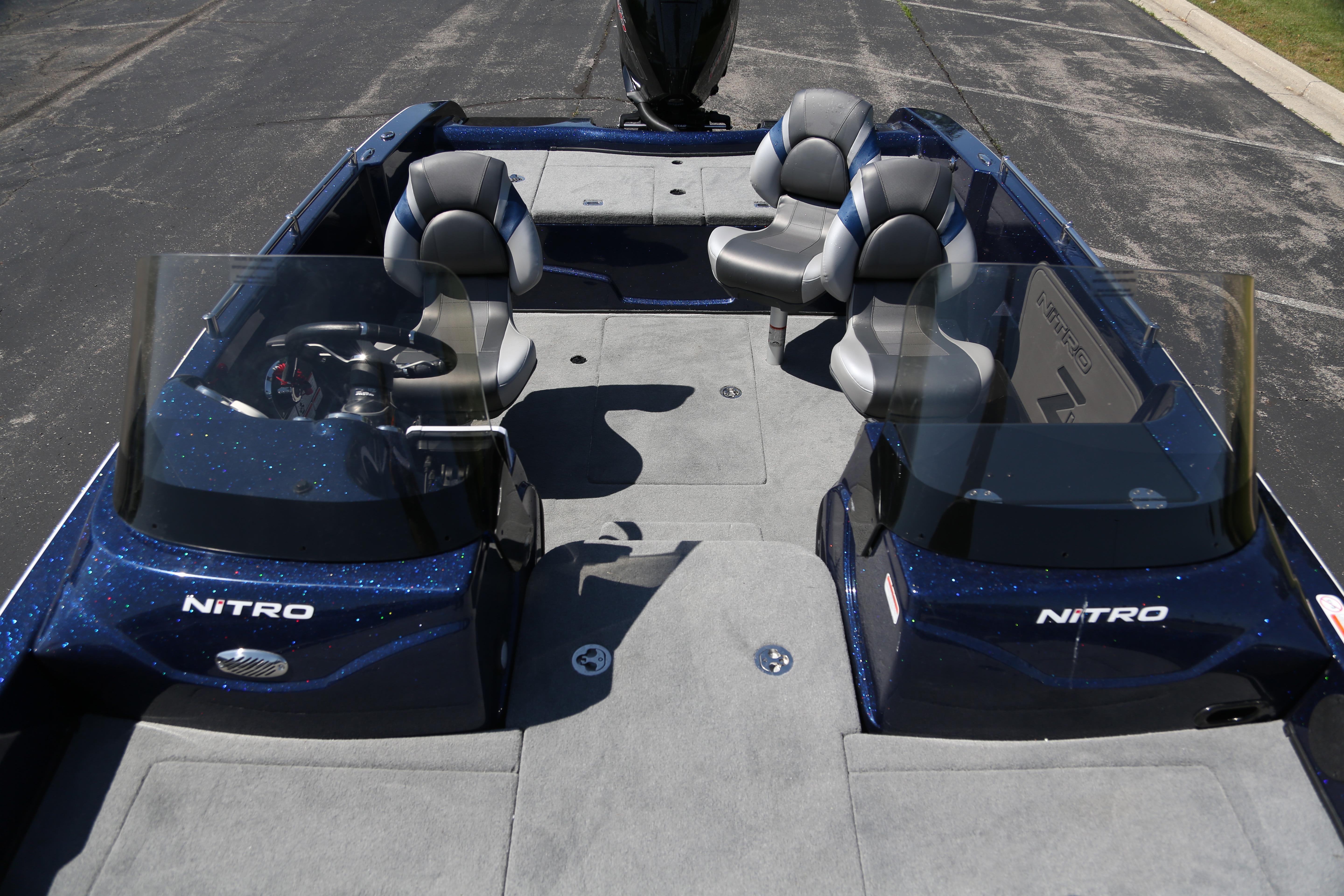 2026 Nitro ZV19 boat interior with dual consoles and seating, featuring a sleek design.