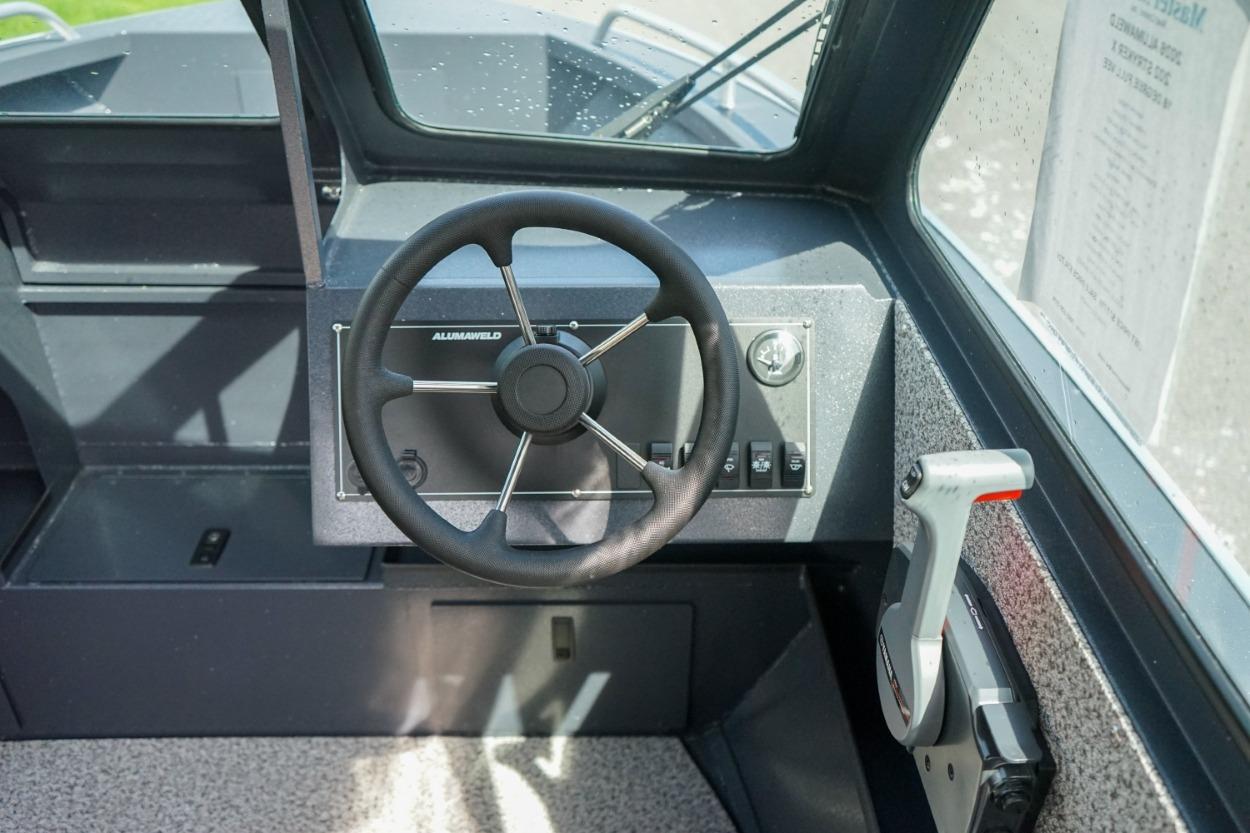 2026 Alumaweld X202 Stryker boat steering console with controls and dashboard.