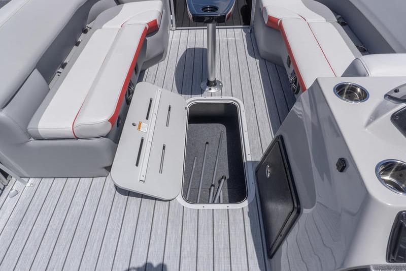 Interior of 2026 SunCatcher Select 322SL boat with seating and storage compartments.