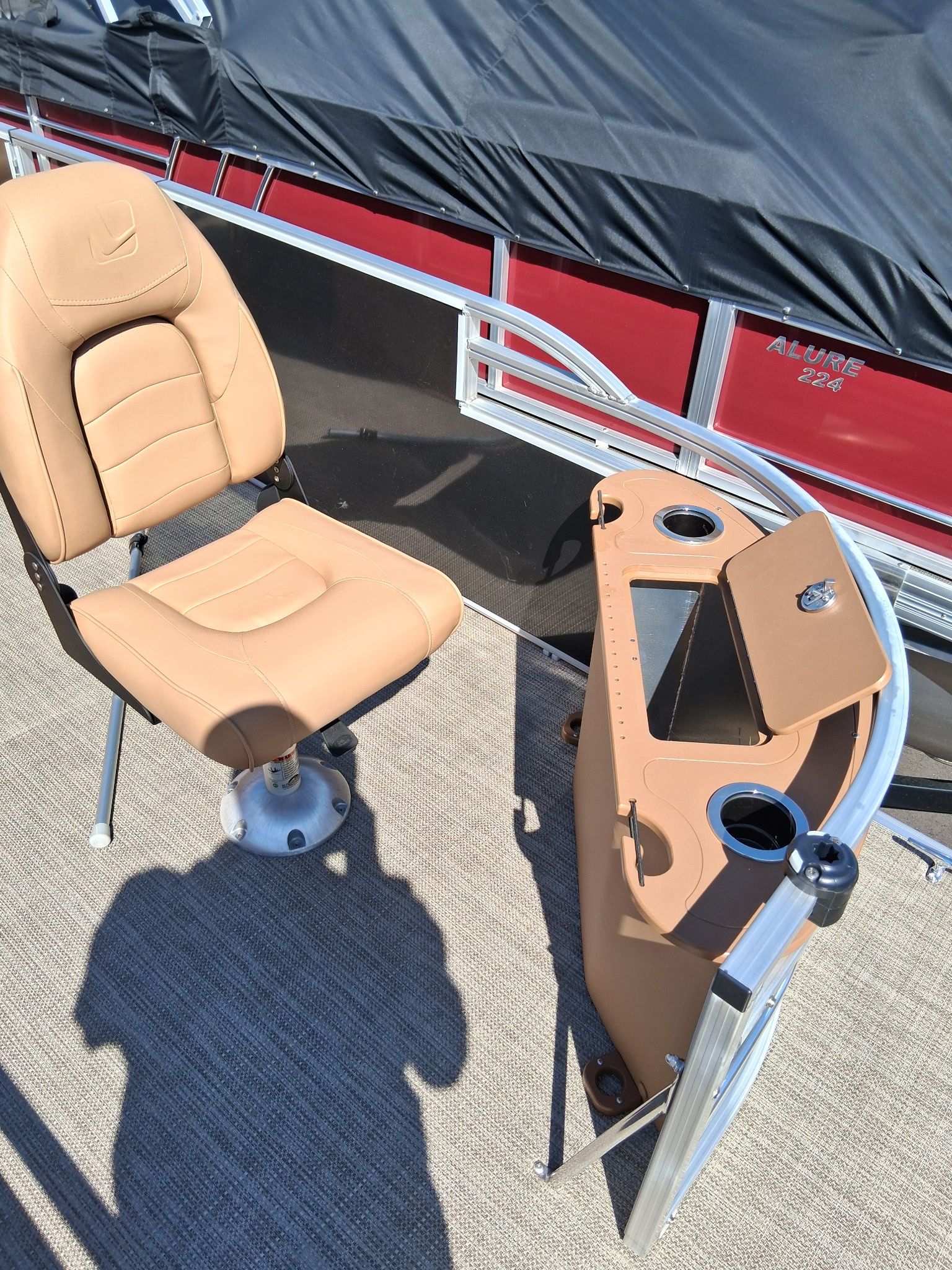 Landau Alure 23CC 2026 boat with seat and helm console.