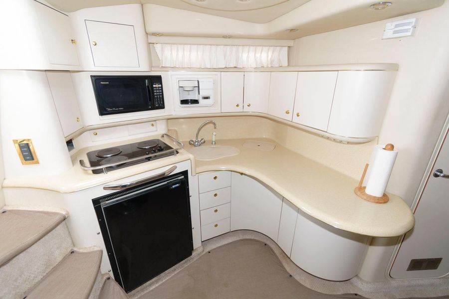 Interior of 1998 Sea Ray Sundancer 370 yacht kitchen.