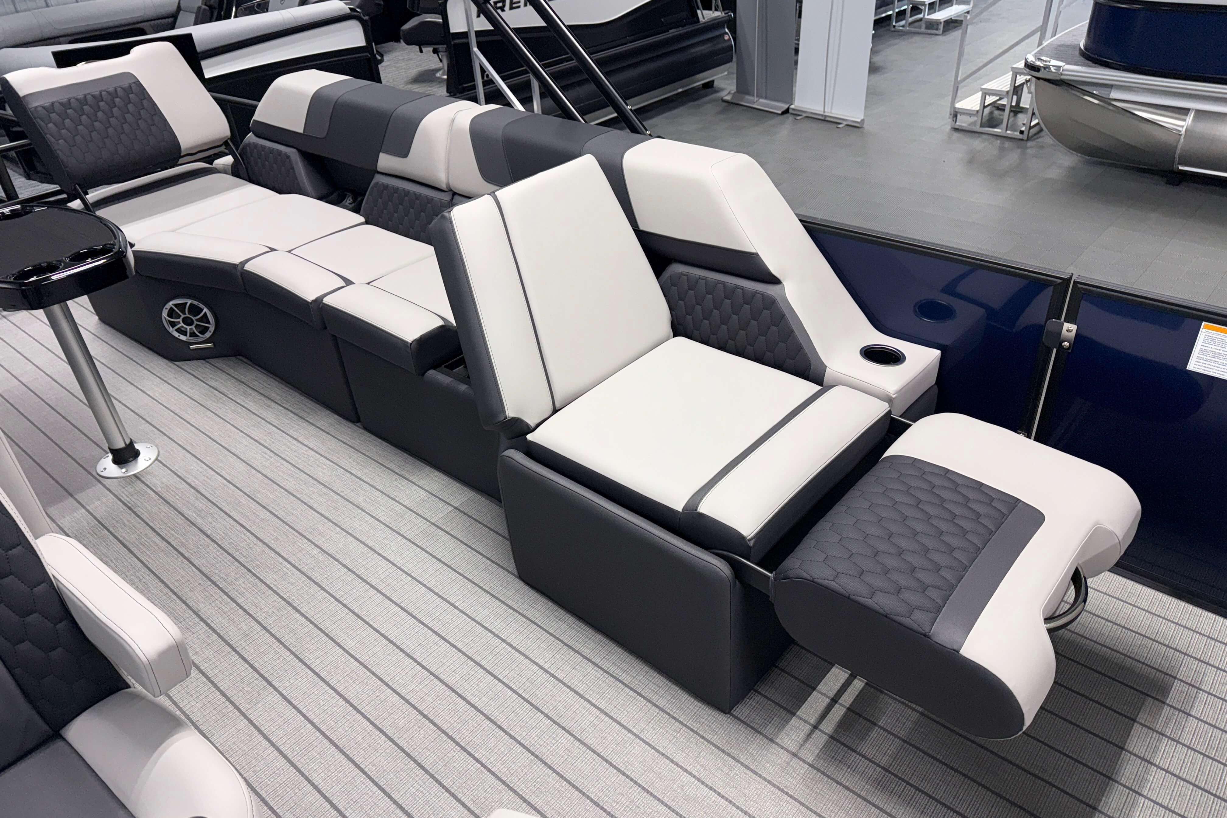 Luxurious seating on 2026 Sylvan L3 SLZ pontoon boat with modern design and comfort features.