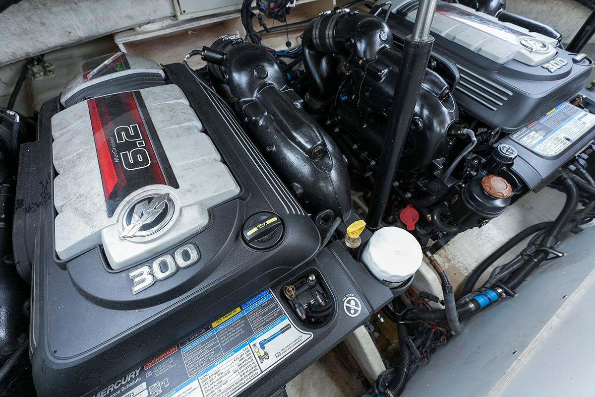 Engine compartment of a 2018 Sea Ray SLX 350 with dual Mercury 6.2L engines.