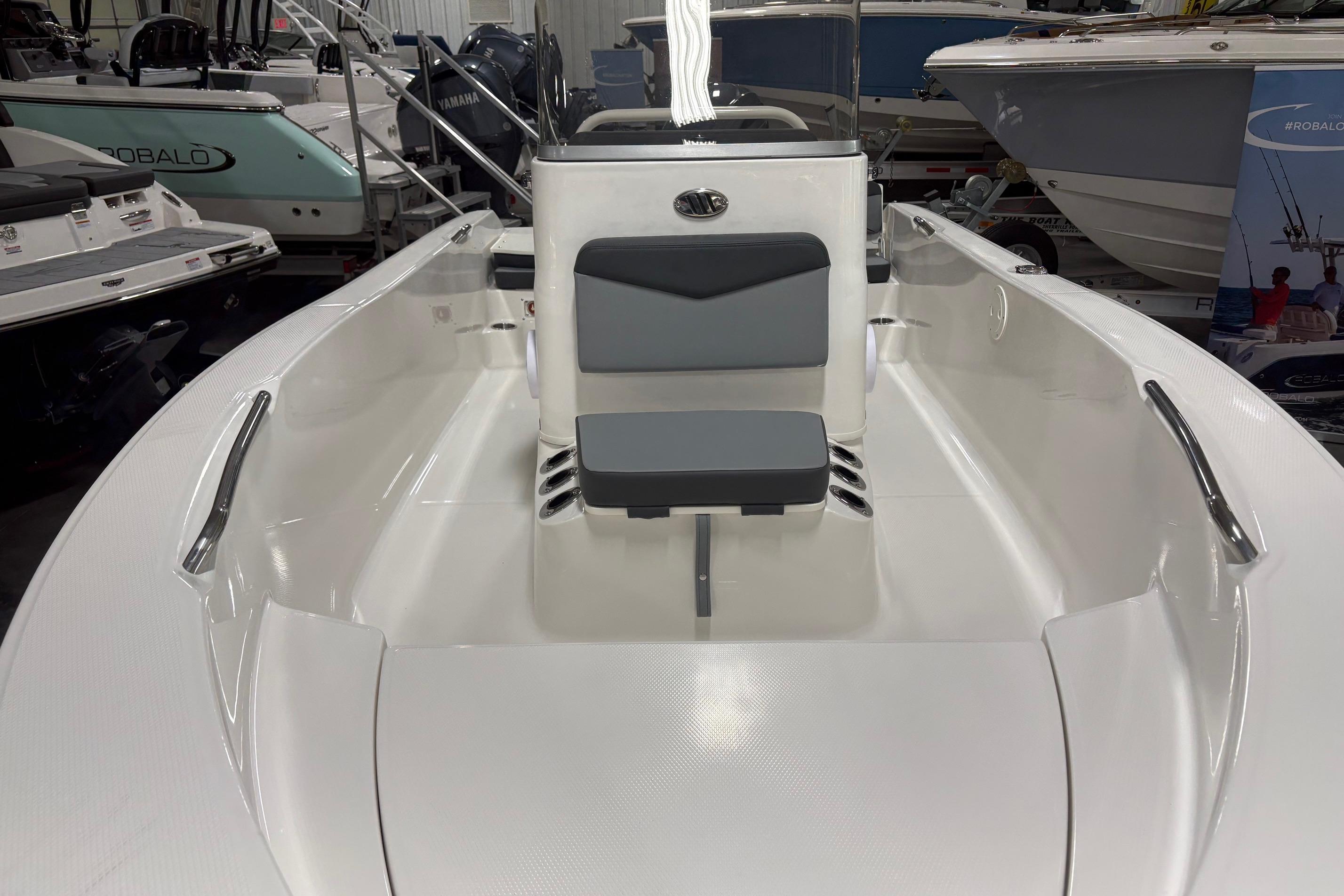 2026 Robalo R160 Center Console boat interior with seating and steering console.