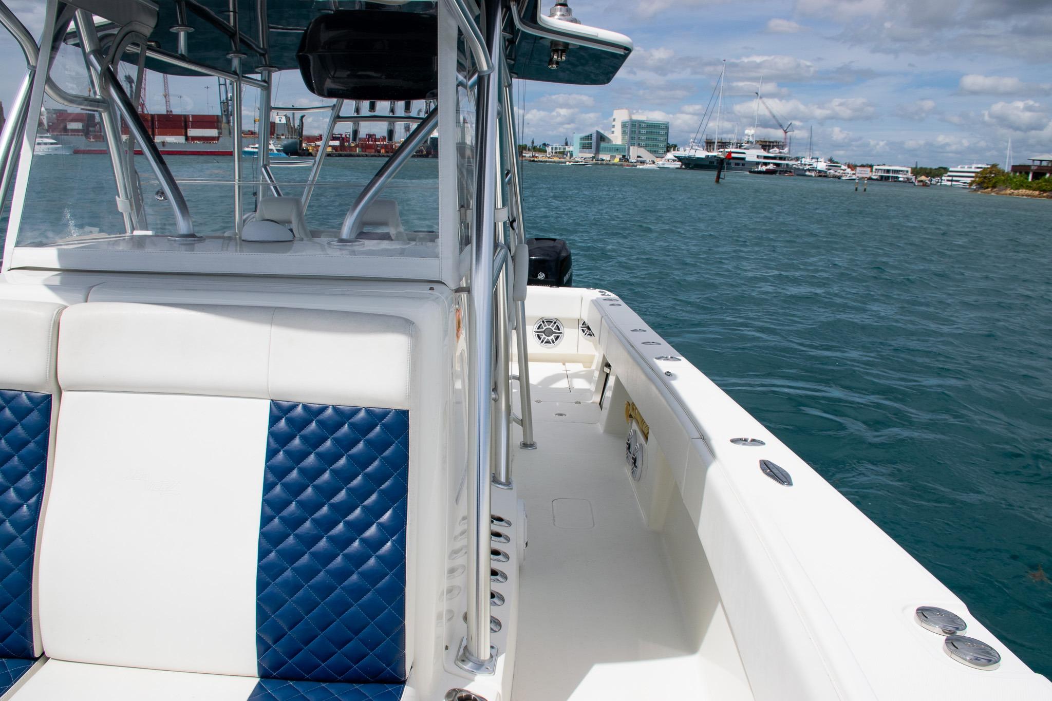 2022 SeaVee 390Z boat with blue and white seating on open water.