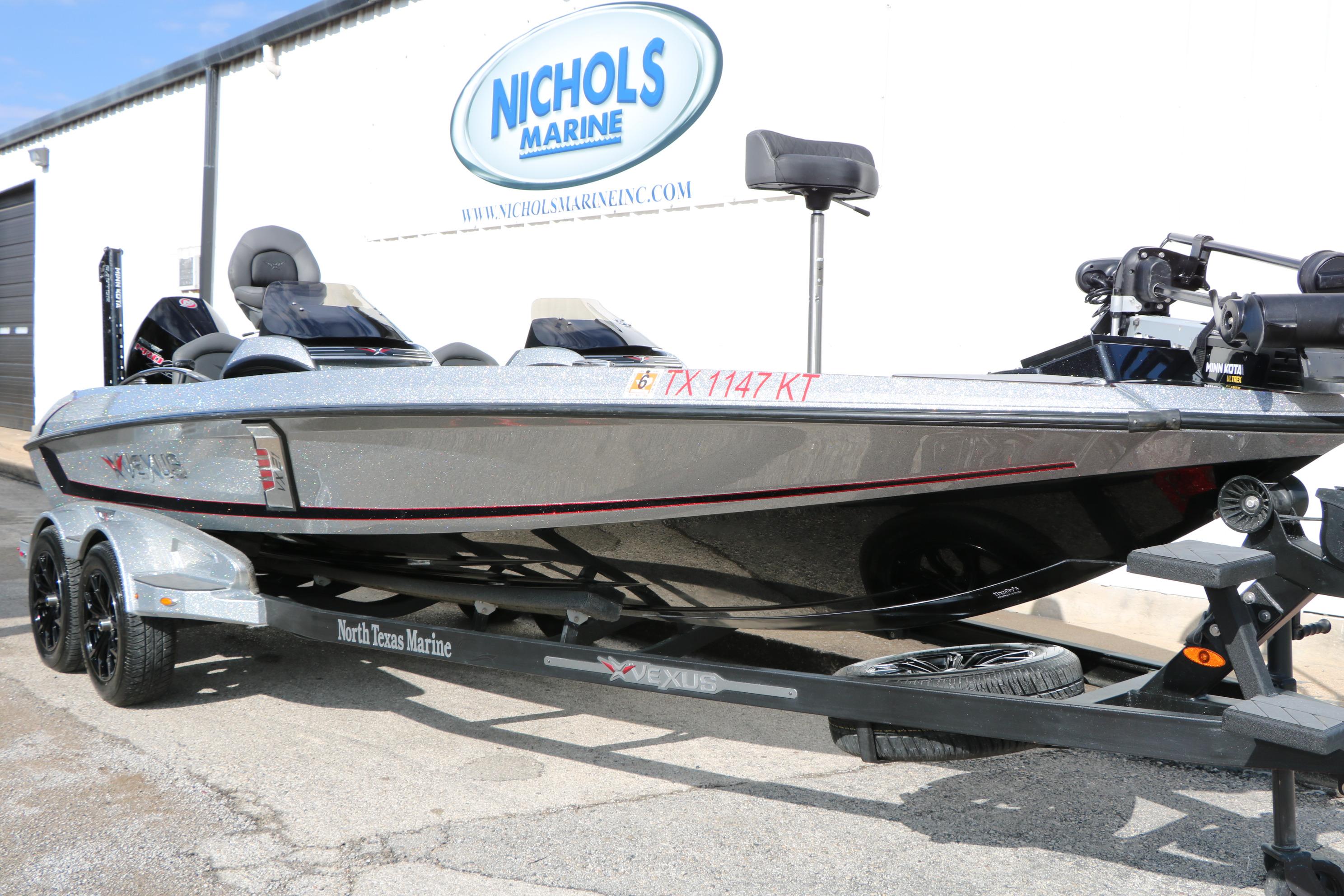 2022 Vexus VX21 boat on trailer at Nichols Marine dealership.