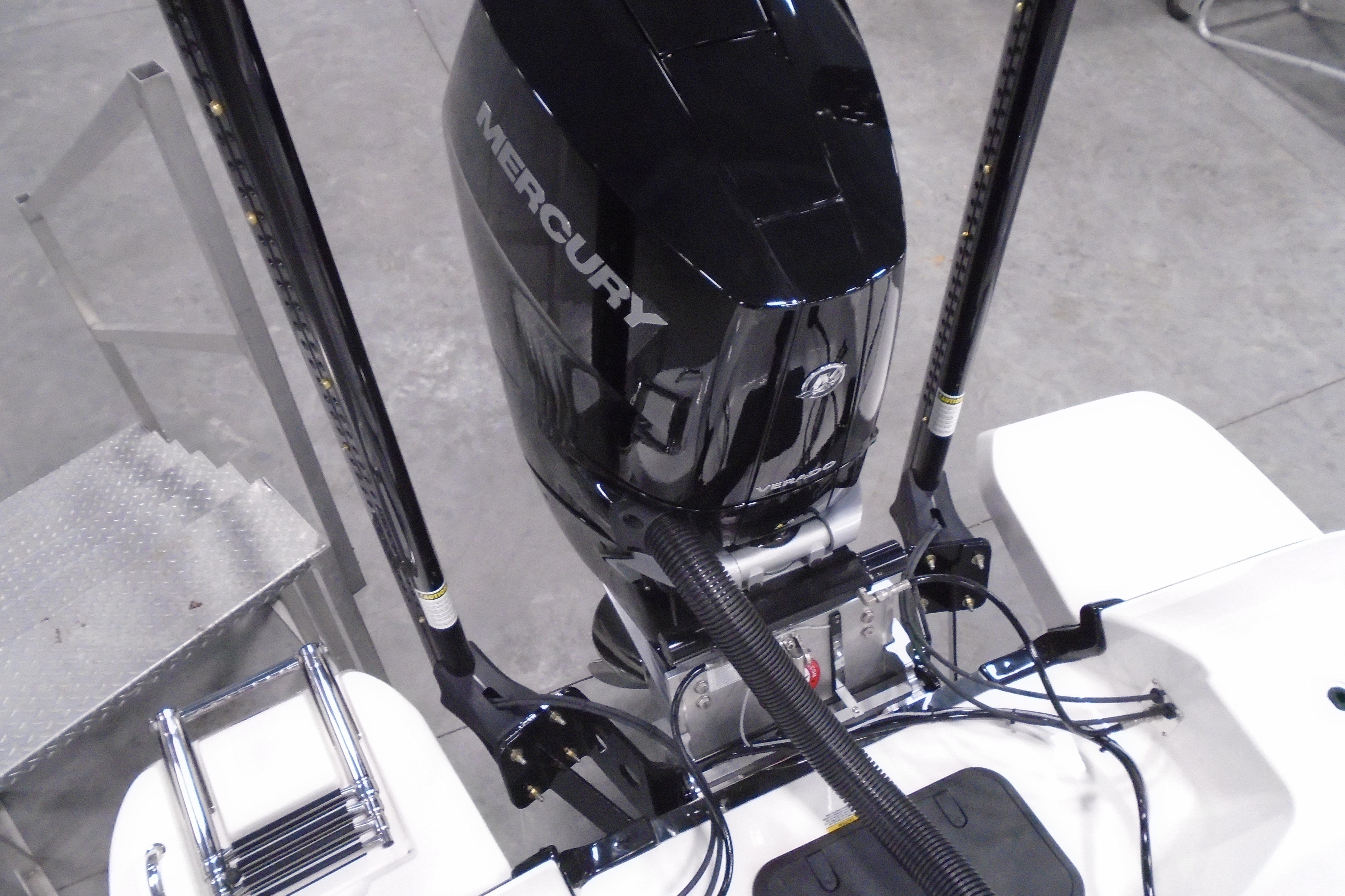 2026 Caymas 26 HB boat with Mercury outboard motor, viewed from above.
