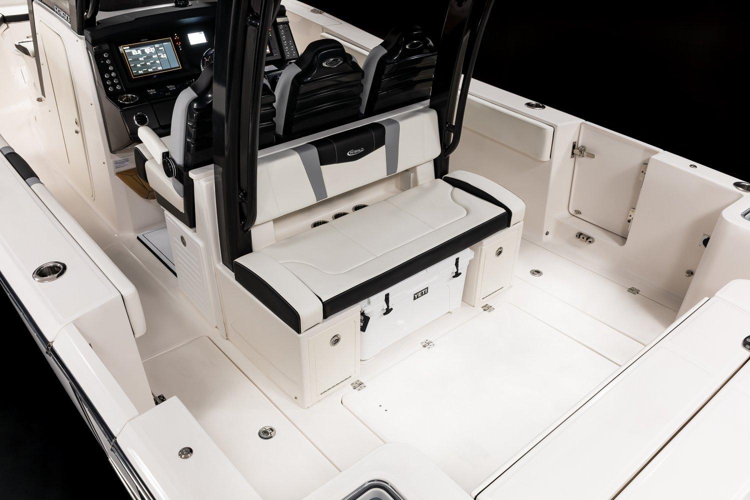 Manufacturer Provided Image: 2026 Robalo R360 Center Console boat interior with seating and control panel.