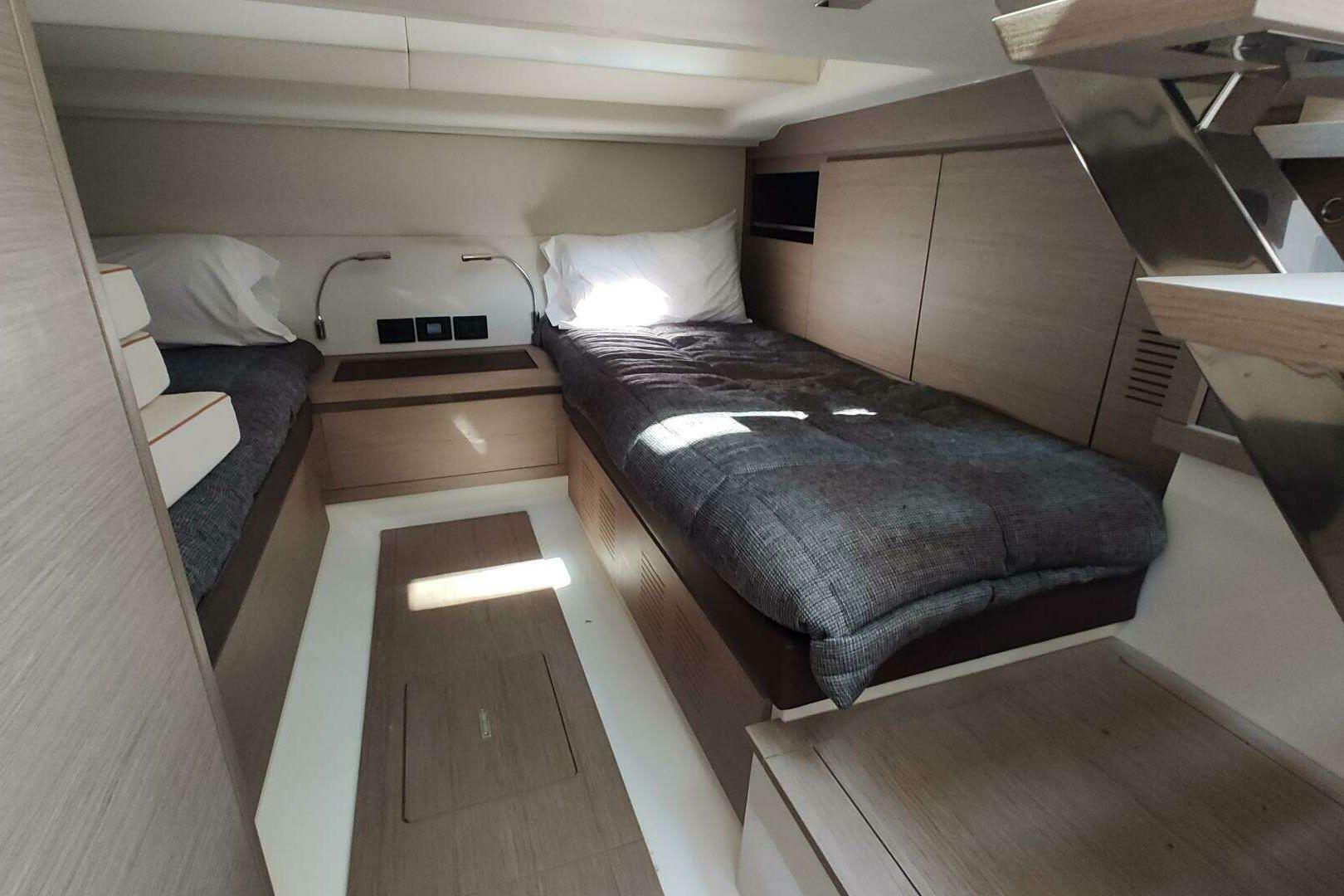 2023 Pardo Yachts P43 cabin interior with twin beds and modern design.
