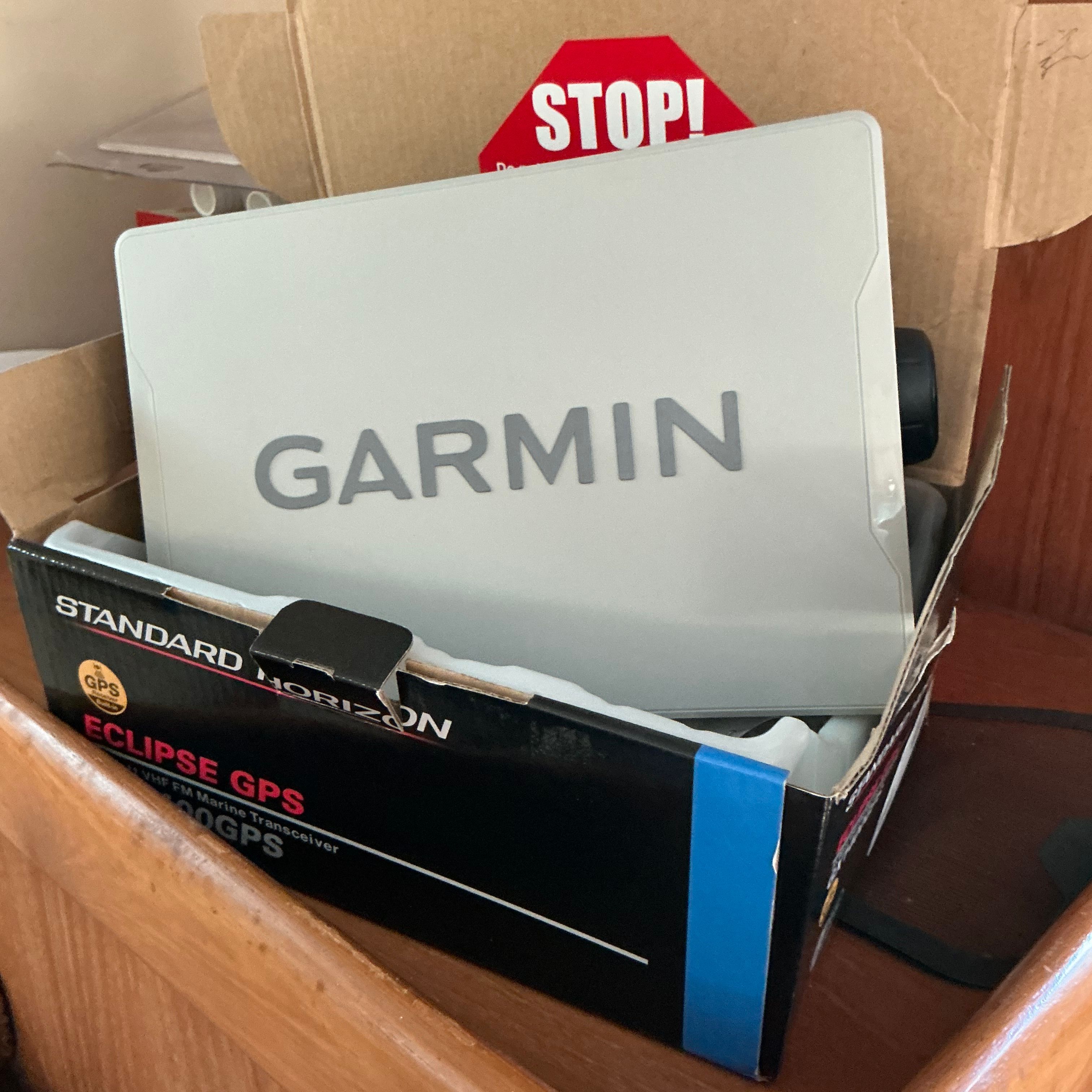 Garmin GPS in a Standard Horizon box on Mainship Pilot 30, 1999.
