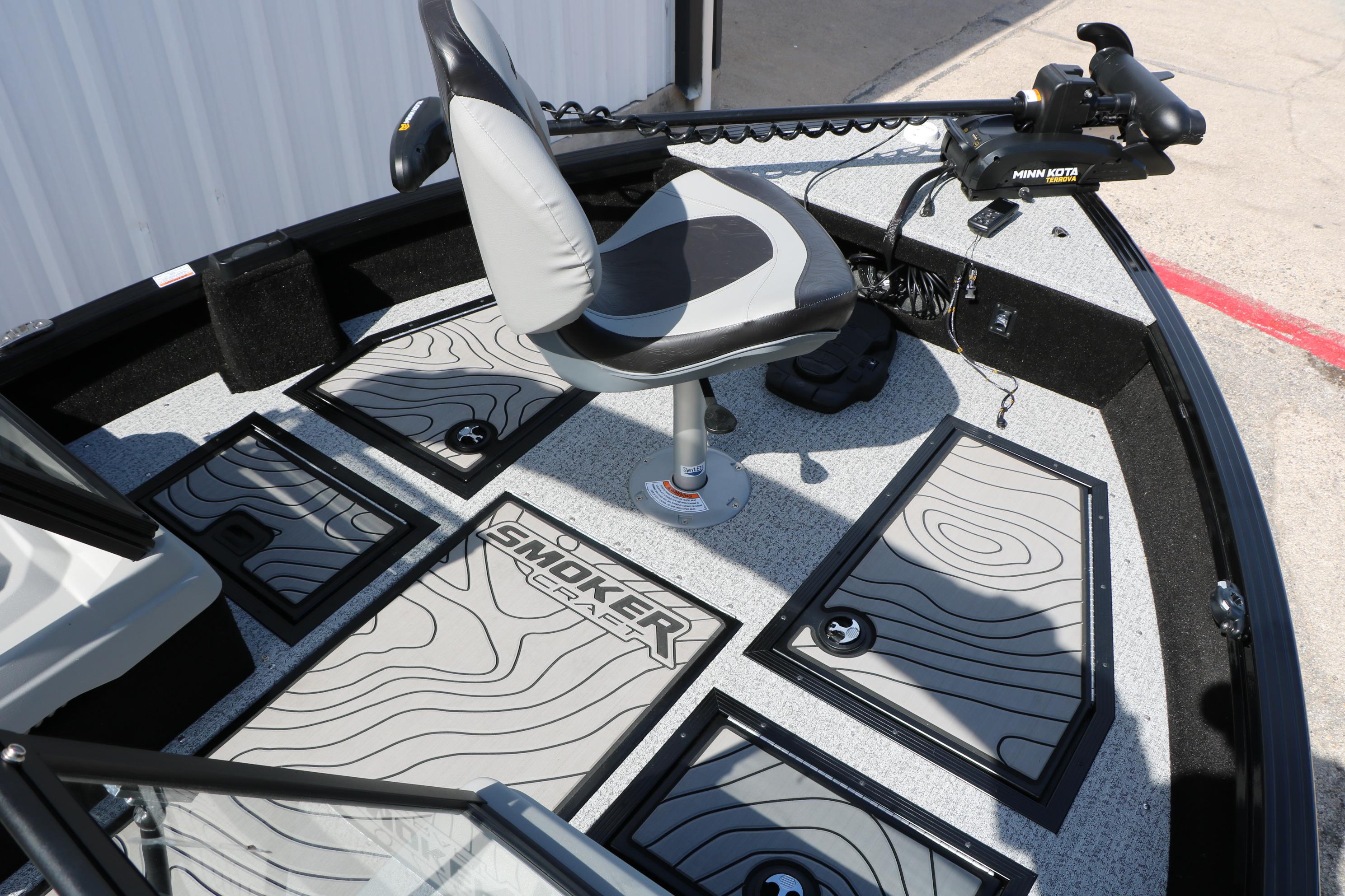 2025 Smoker Craft Adventurer 188 DC boat interior with seating and Minn Kota trolling motor.