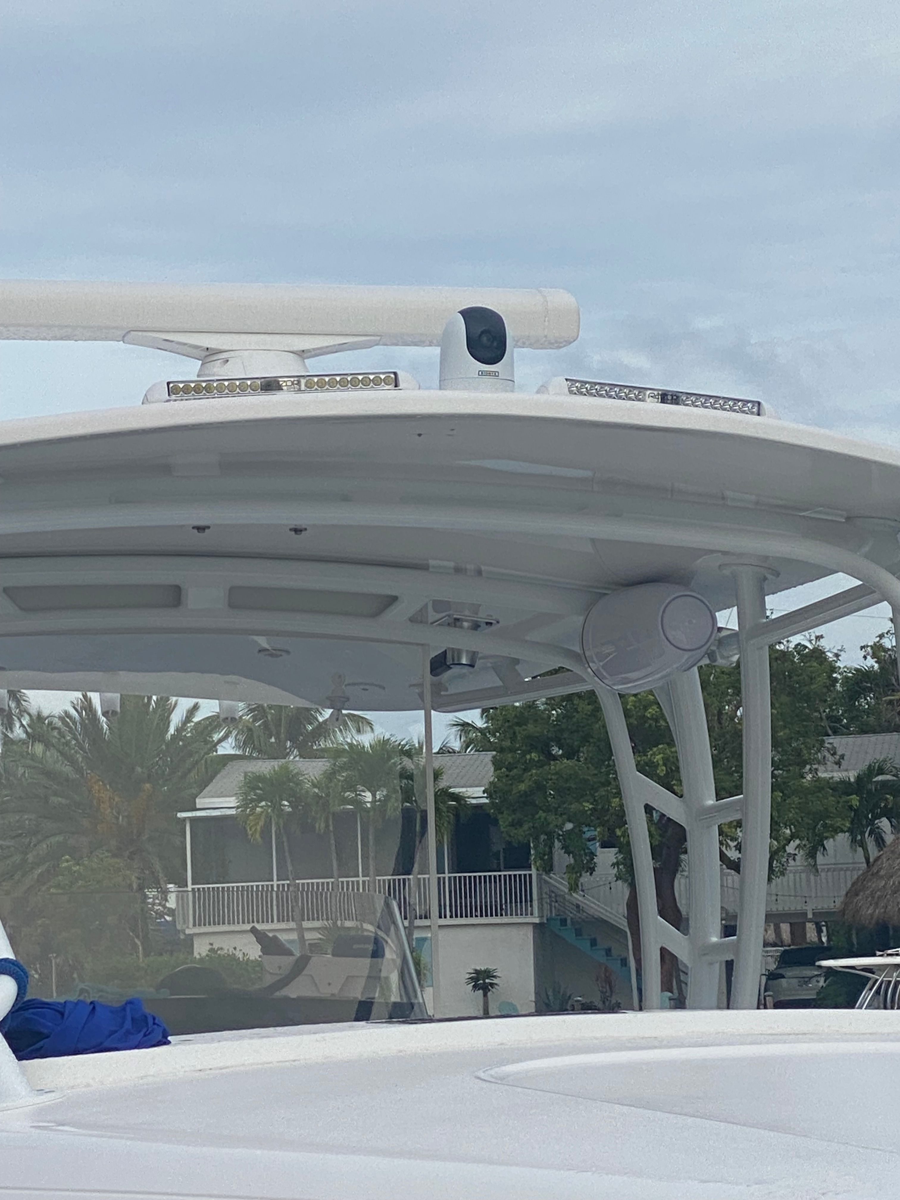 The image shows the roof of an Intrepid 37 boat with speakers and radar.
