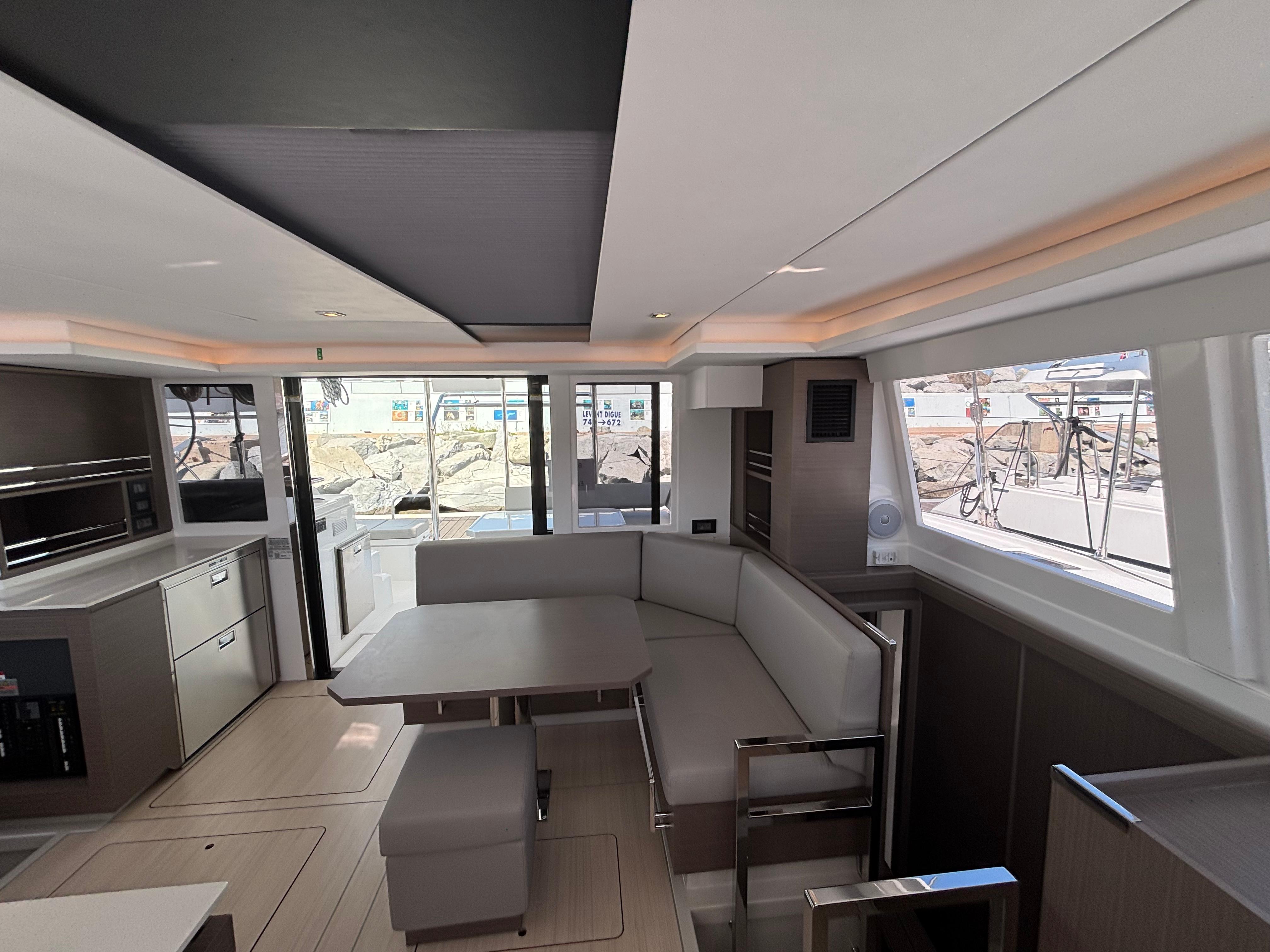 Modern interior of 2025 Leopard 42 yacht with sleek design and spacious seating area.