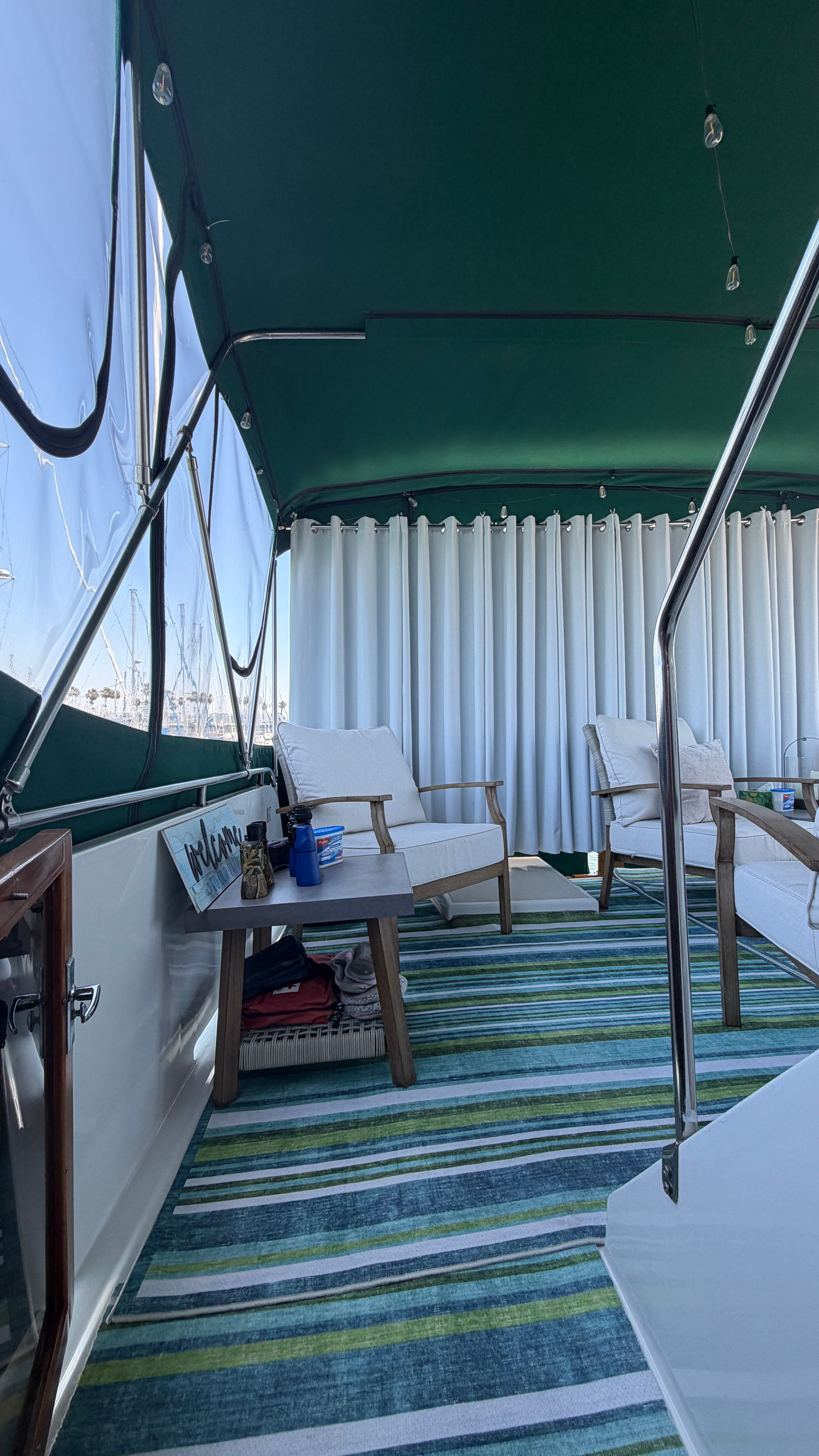 Interior of a 1966 Drake Yachtfisher with green canopy.