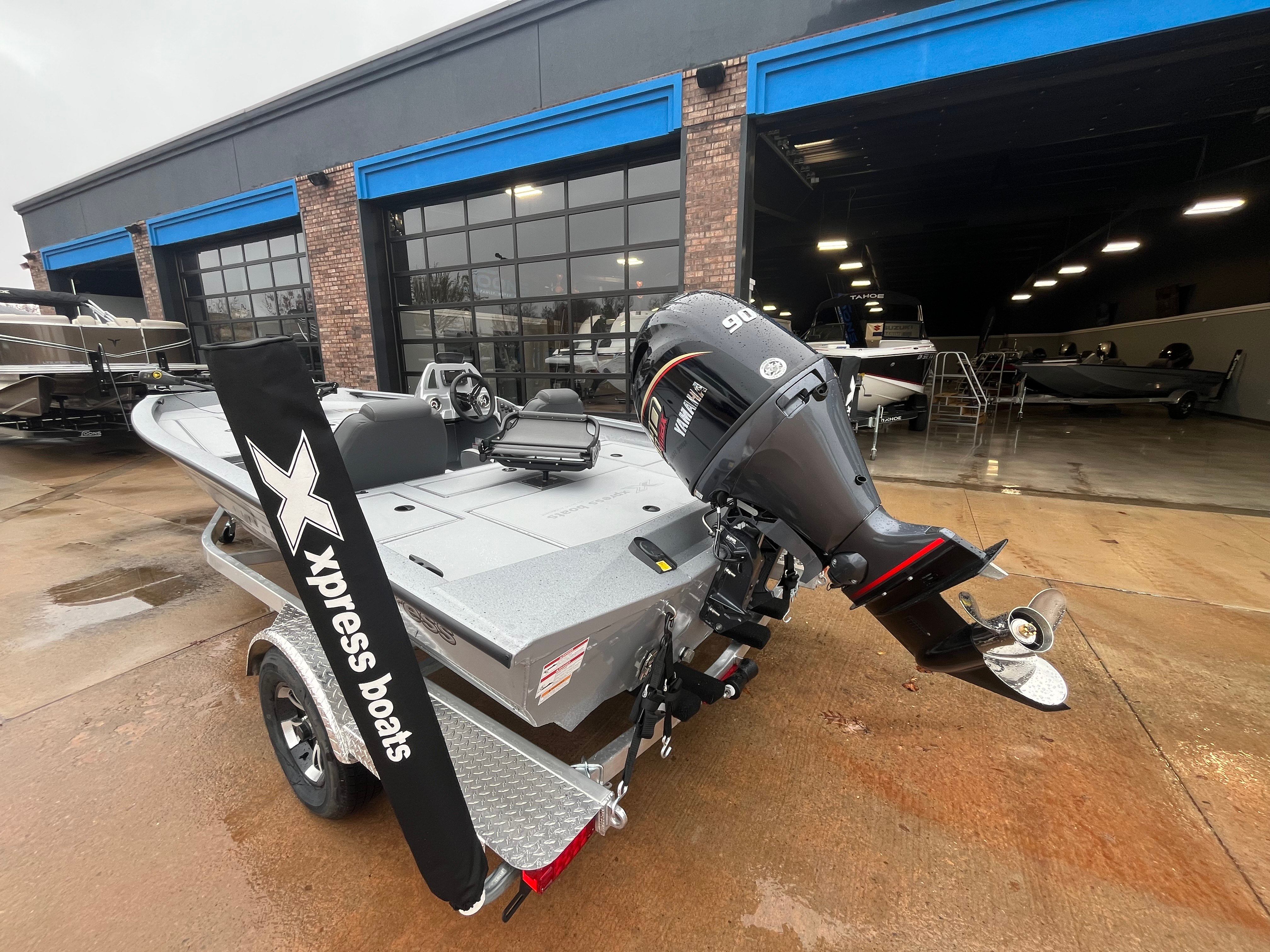 2026 Xpress H18C Crappie boat with Yamaha motor outside showroom.