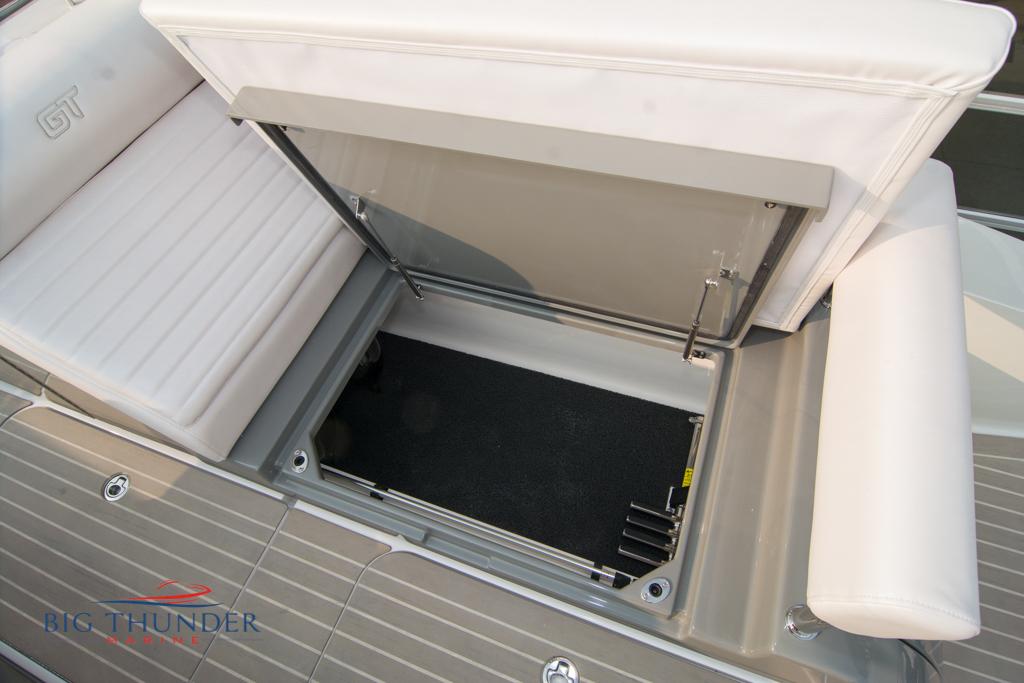 2019 Donzi 41 GT boat storage compartment with open hatch.