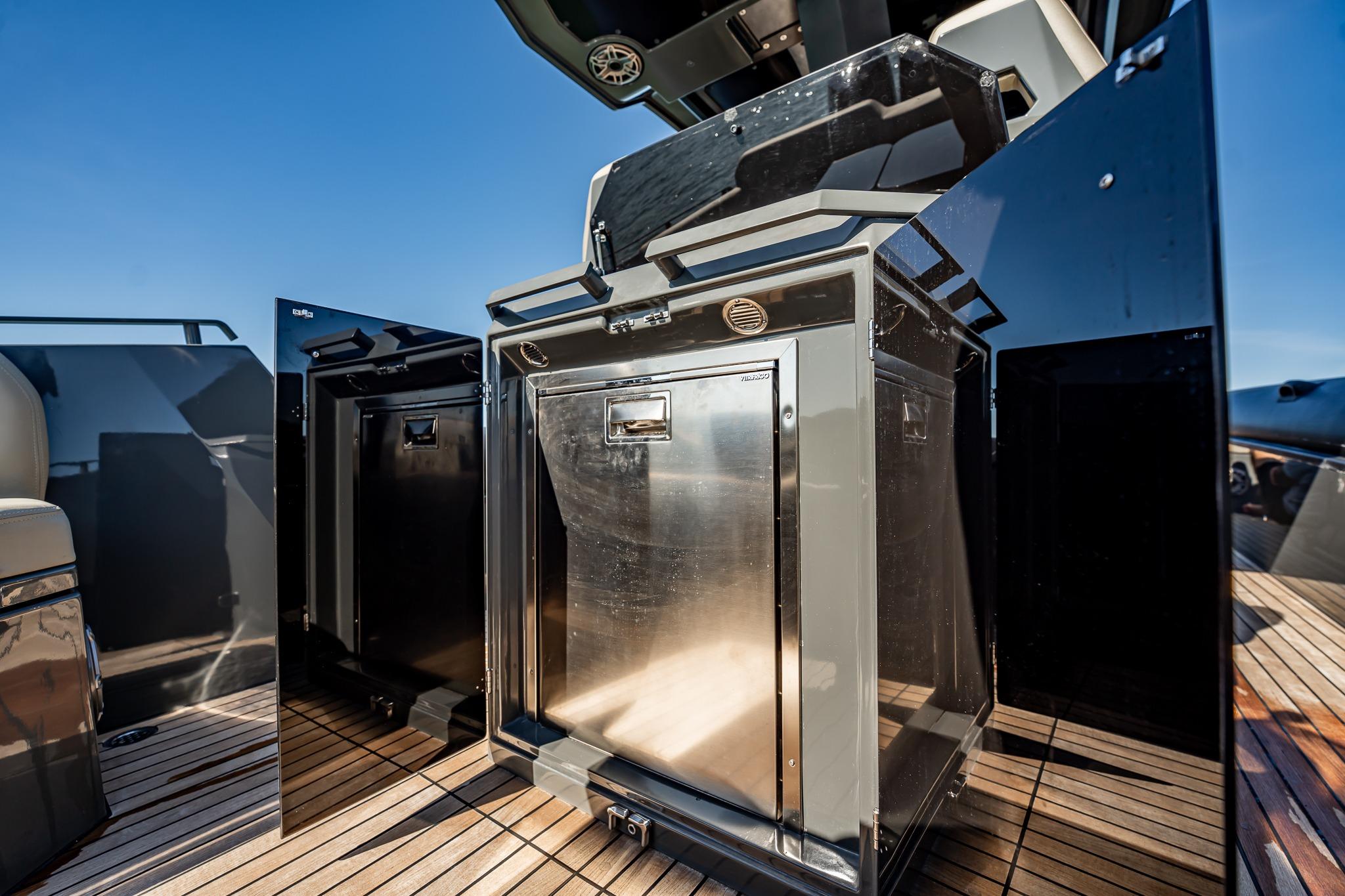 Luxury Skipper-BSK 38NC yacht kitchen area with stainless steel appliances, 2023 model.