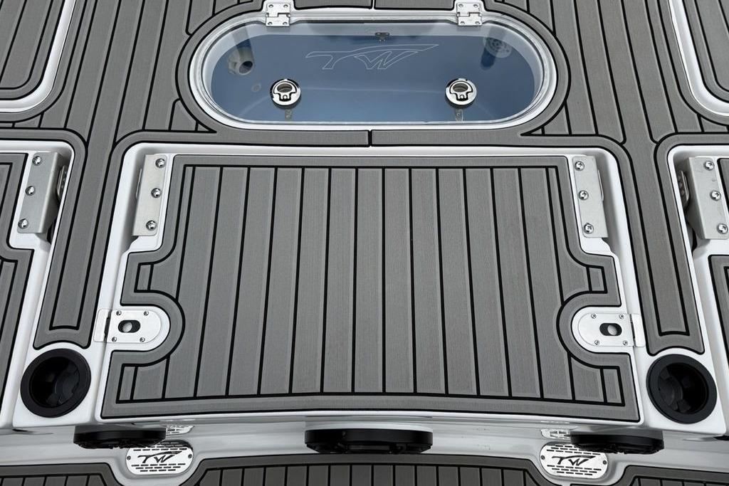 Deck of 2026 Tidewater 2500 Carolina Bay boat with sleek design and storage compartments.