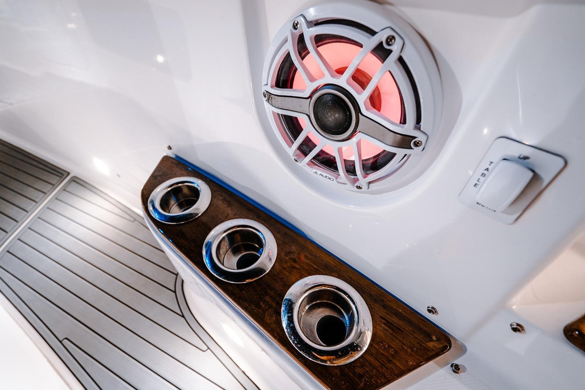 Speaker and cup holders on 2026 Everglades 455 Center Console boat interior.