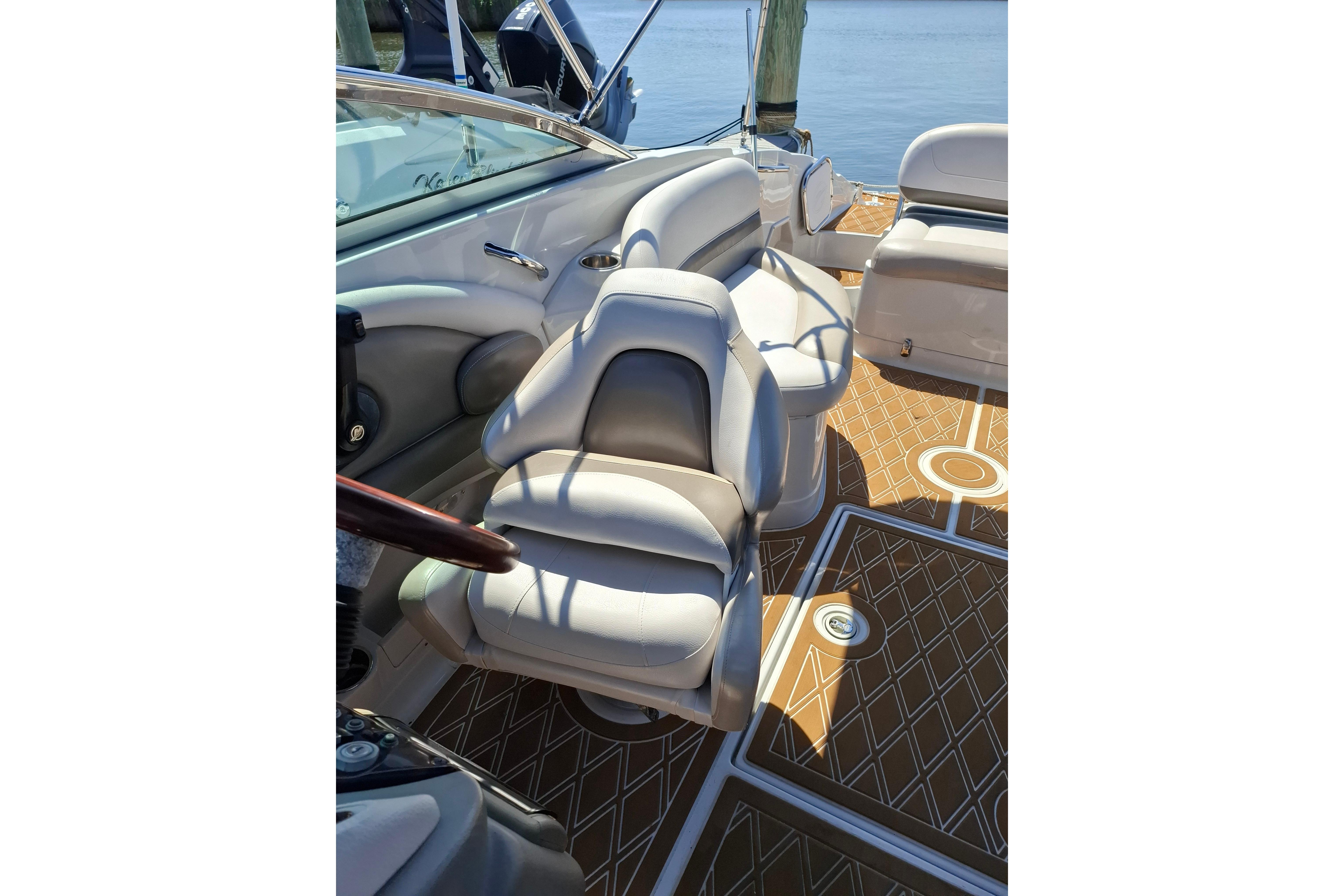 2013 Crownline Eclipse E6 boat interior with luxurious seating and stylish flooring.