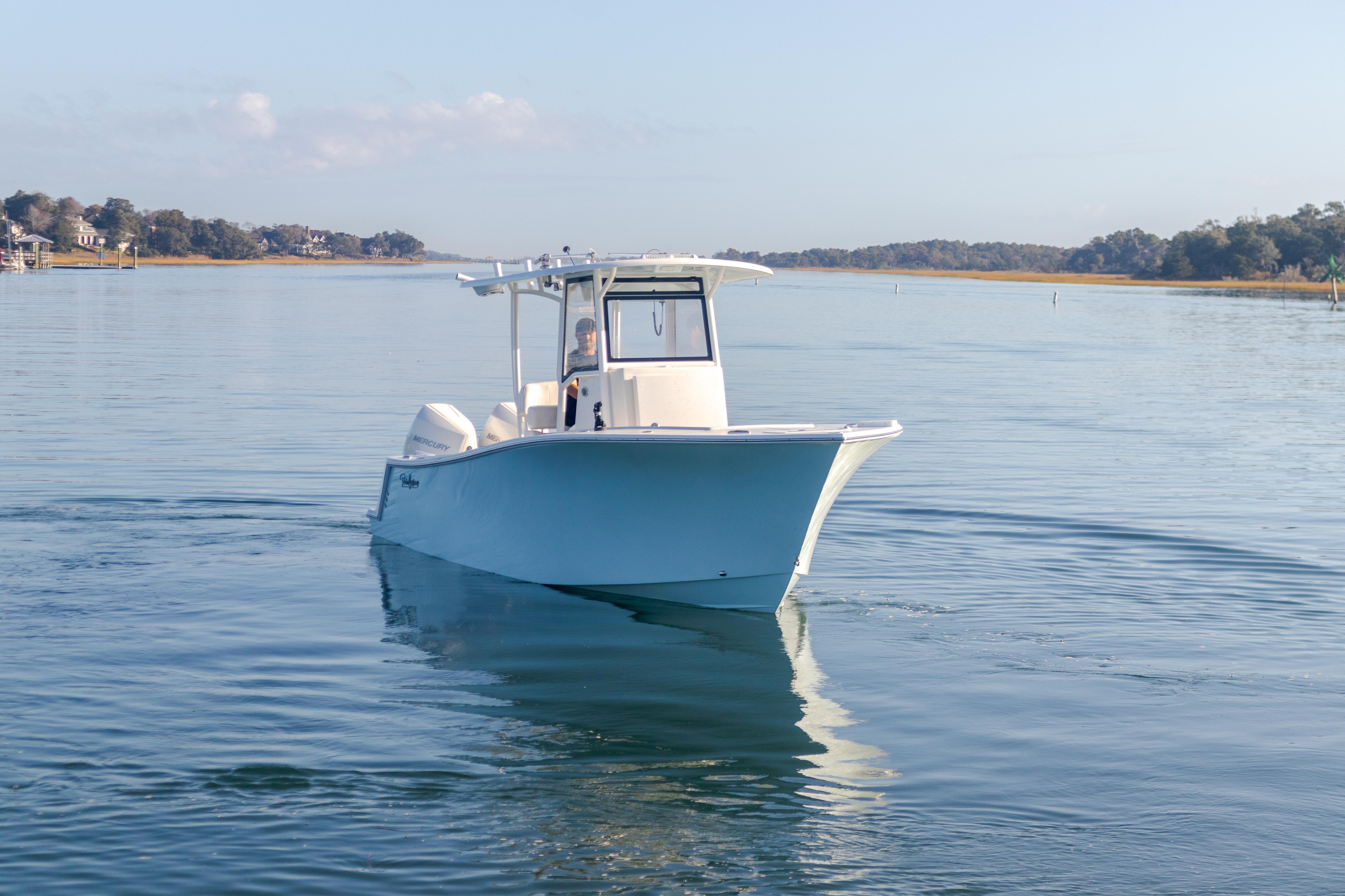 2023 Pair Customs 25 Center Console boat on calm water.