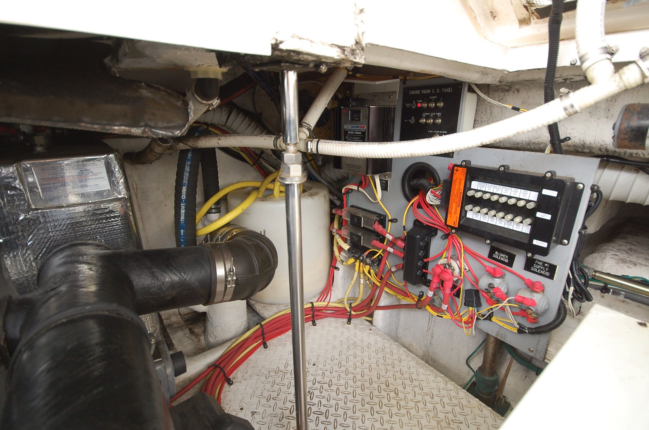 Engine room of 2004 Cruisers Yachts 3970 with wiring.