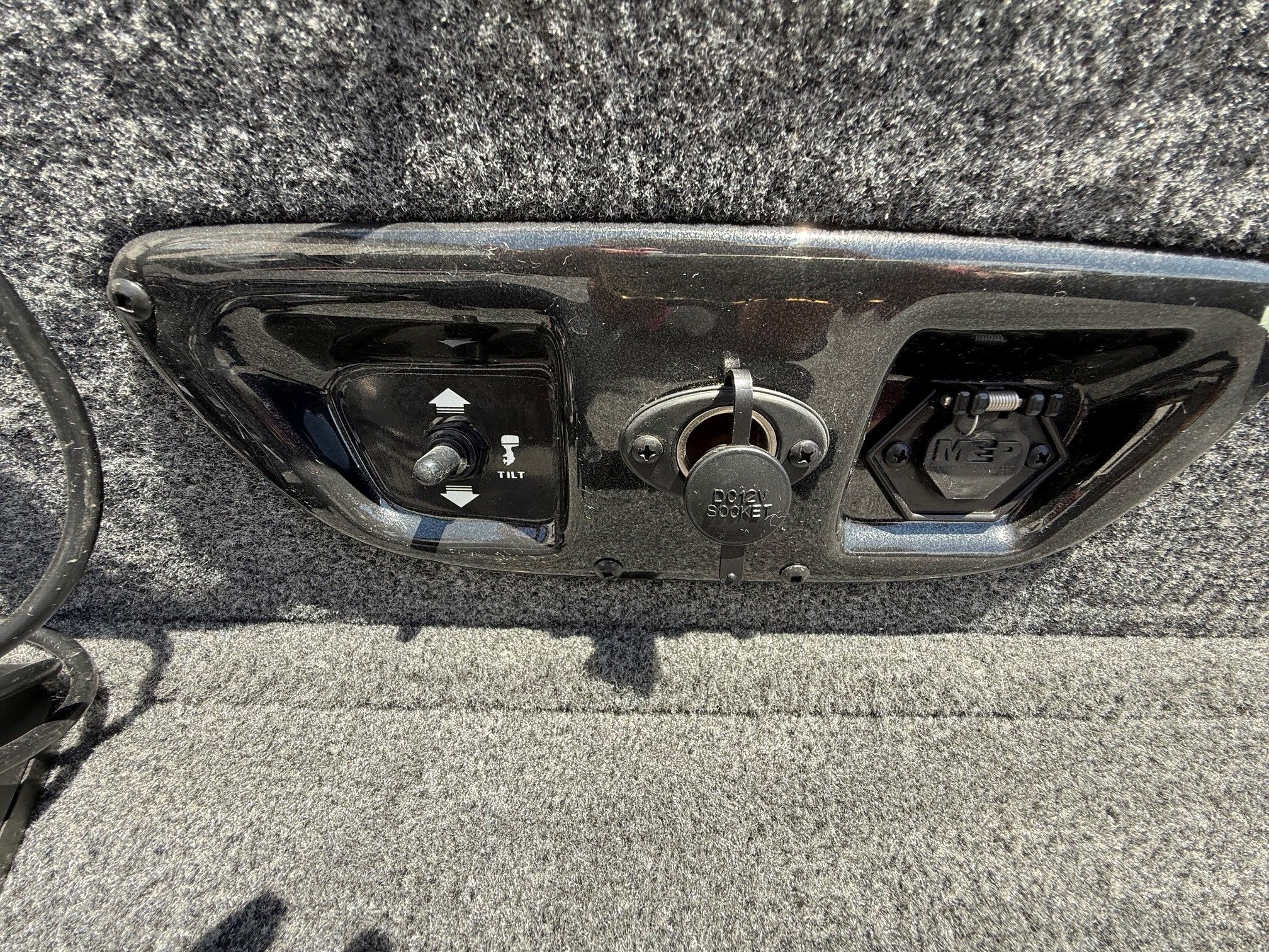 Control panel of 2024 Tracker Pro Guide V175 with socket and switch.