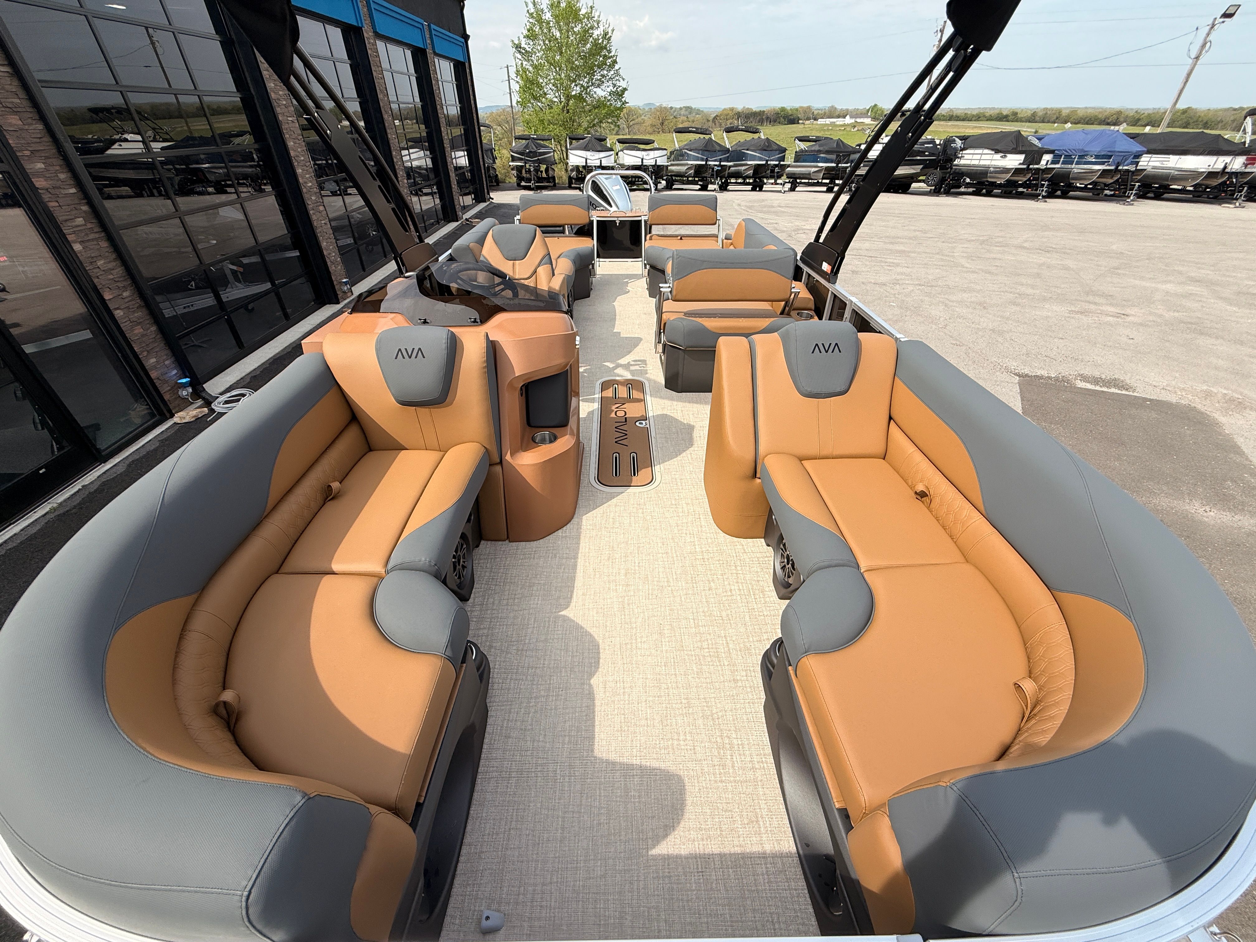 Interior of 2026 Avalon 2385 LSZ pontoon boat with luxurious seating.