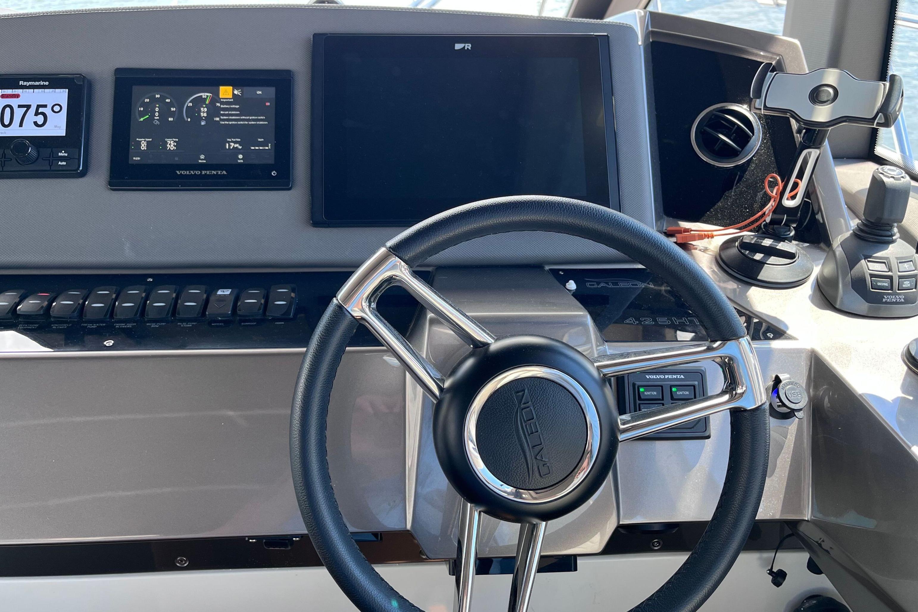 2024 Galeon 425 HTS helm with advanced navigation displays and controls.