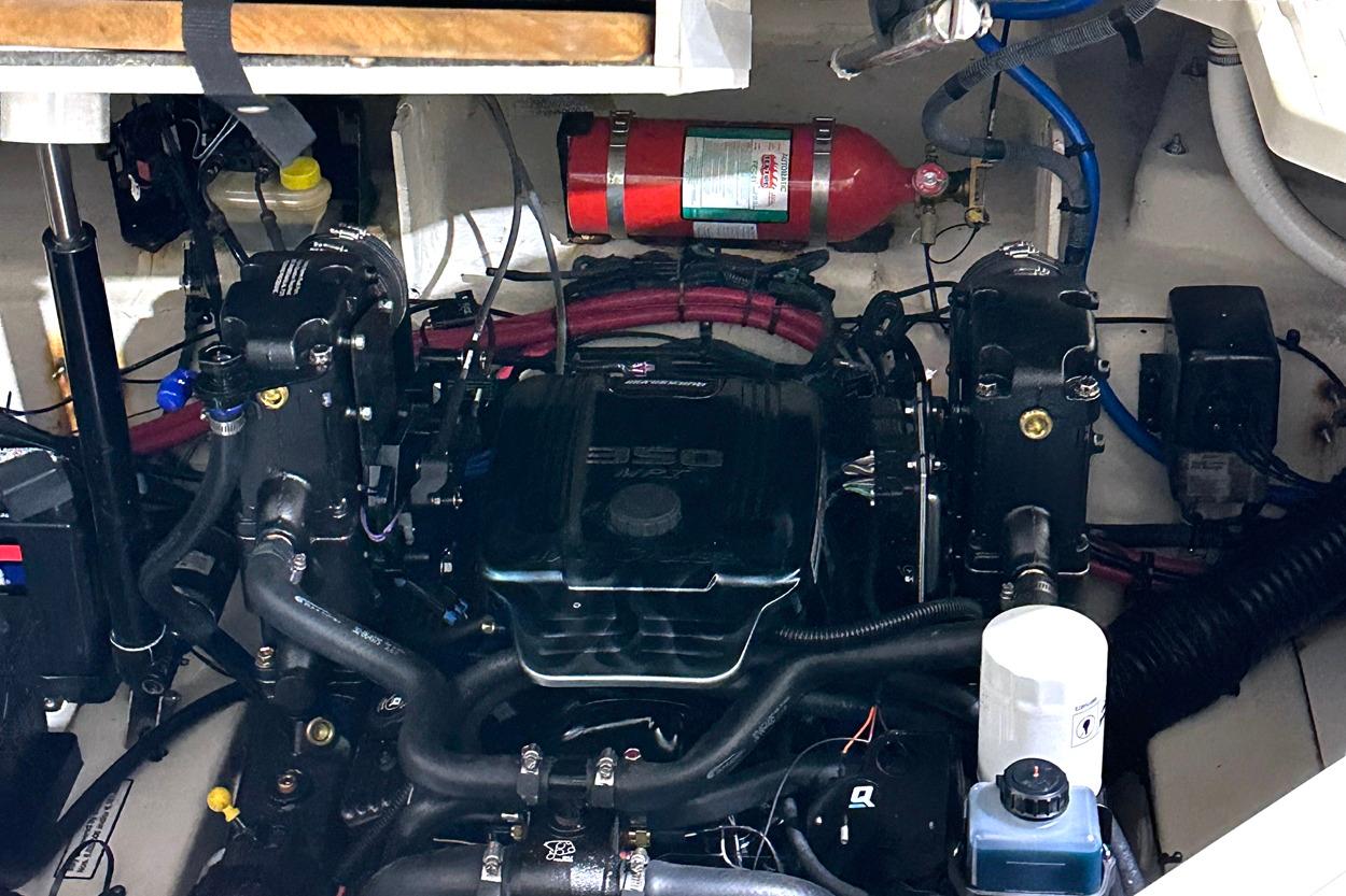Engine compartment of a 2007 Sea Ray Sundancer 260 boat, featuring a 350 engine.