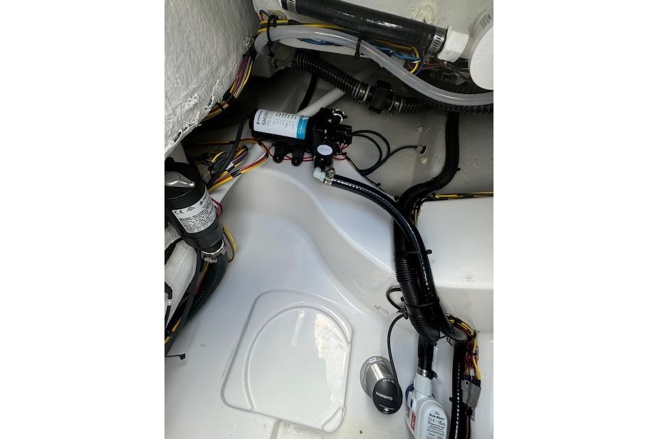 2025 Sportsman Masters 267OE Bay Boat interior wiring and components.