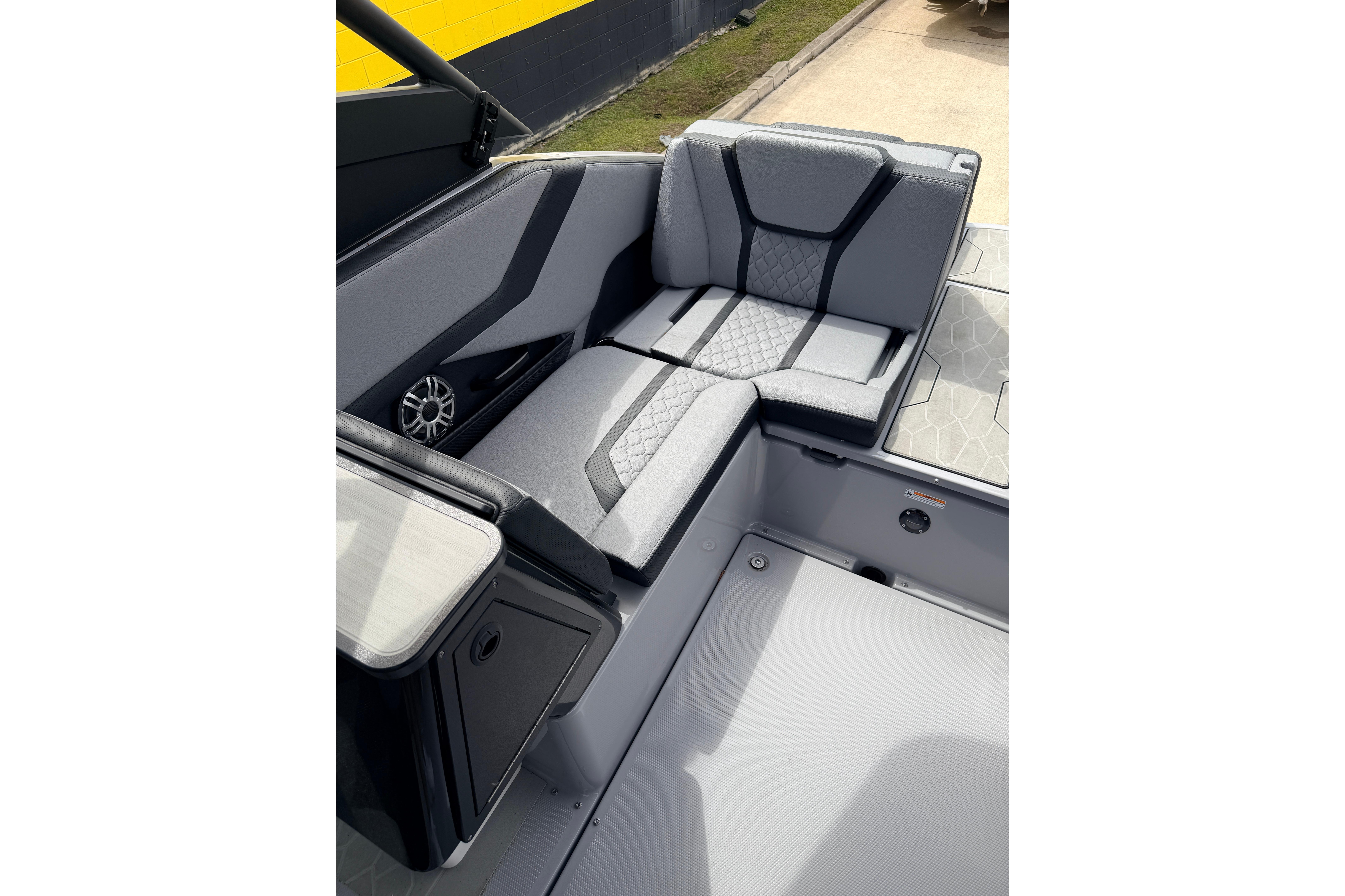 2026 Yamaha Boats 255XD interior with sleek gray seating and modern design.
