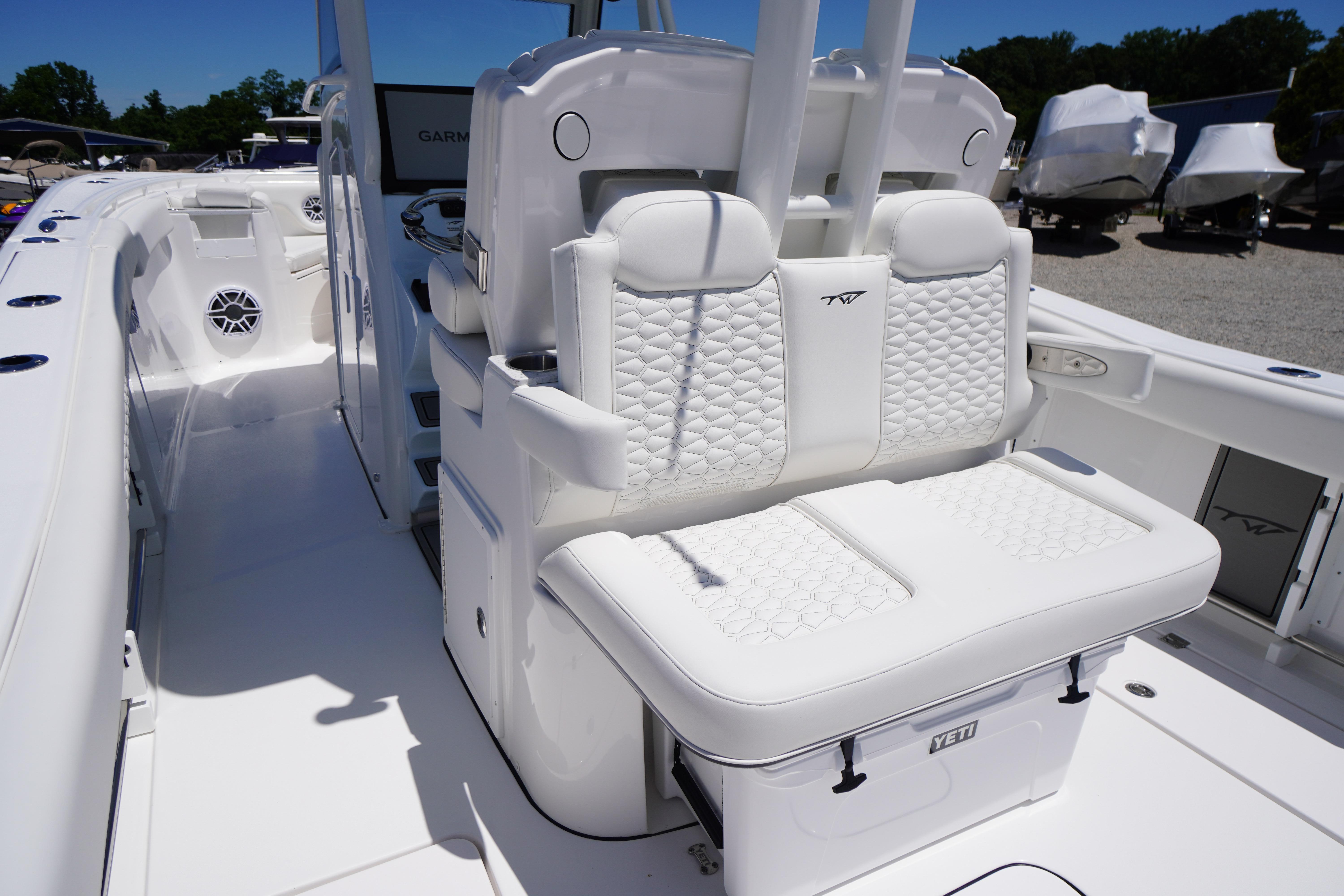 2026 Tidewater 302 CC Adventure boat interior with white seating and modern design.