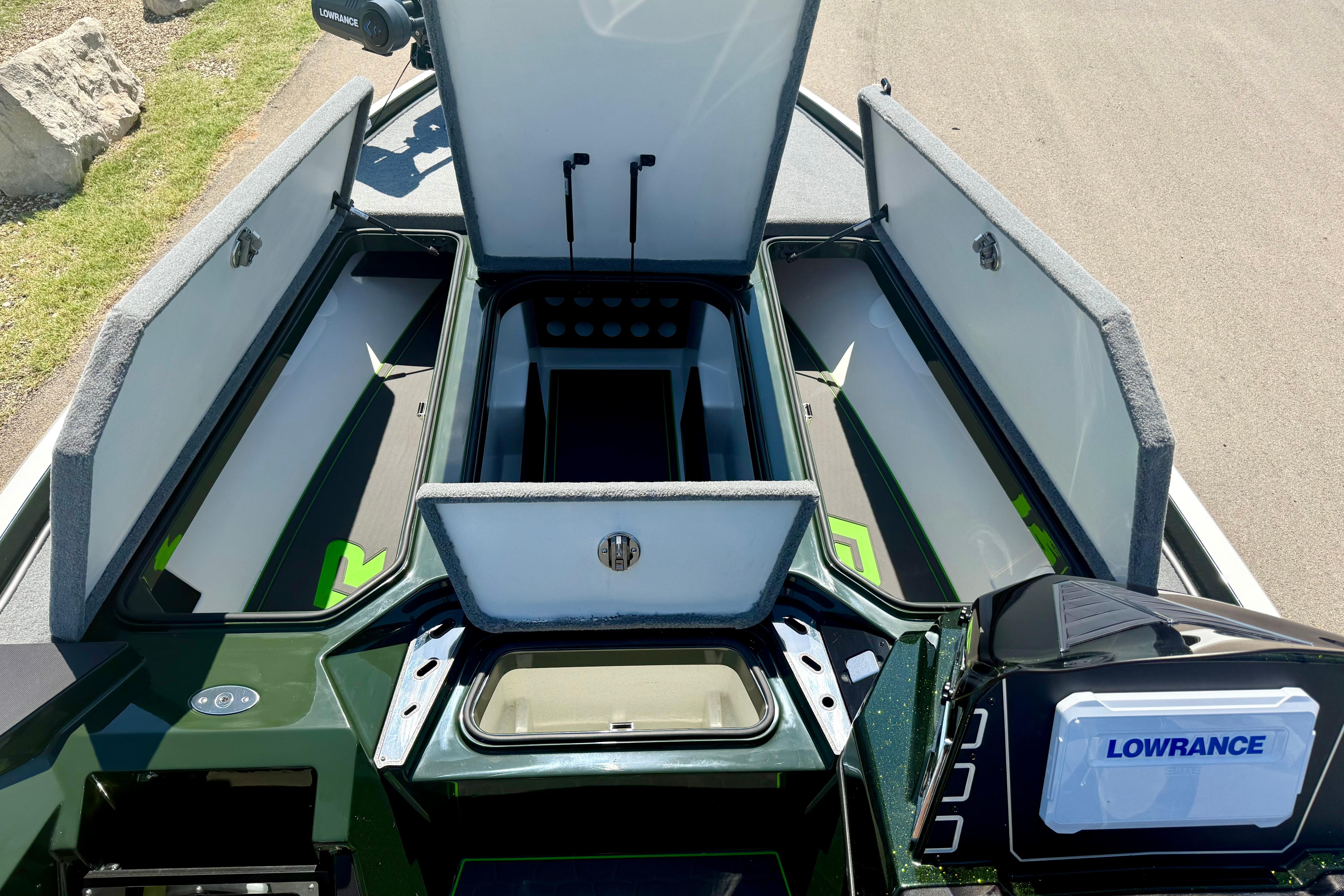 2026 Ranger Z519R boat storage compartments open, featuring Lowrance electronics.