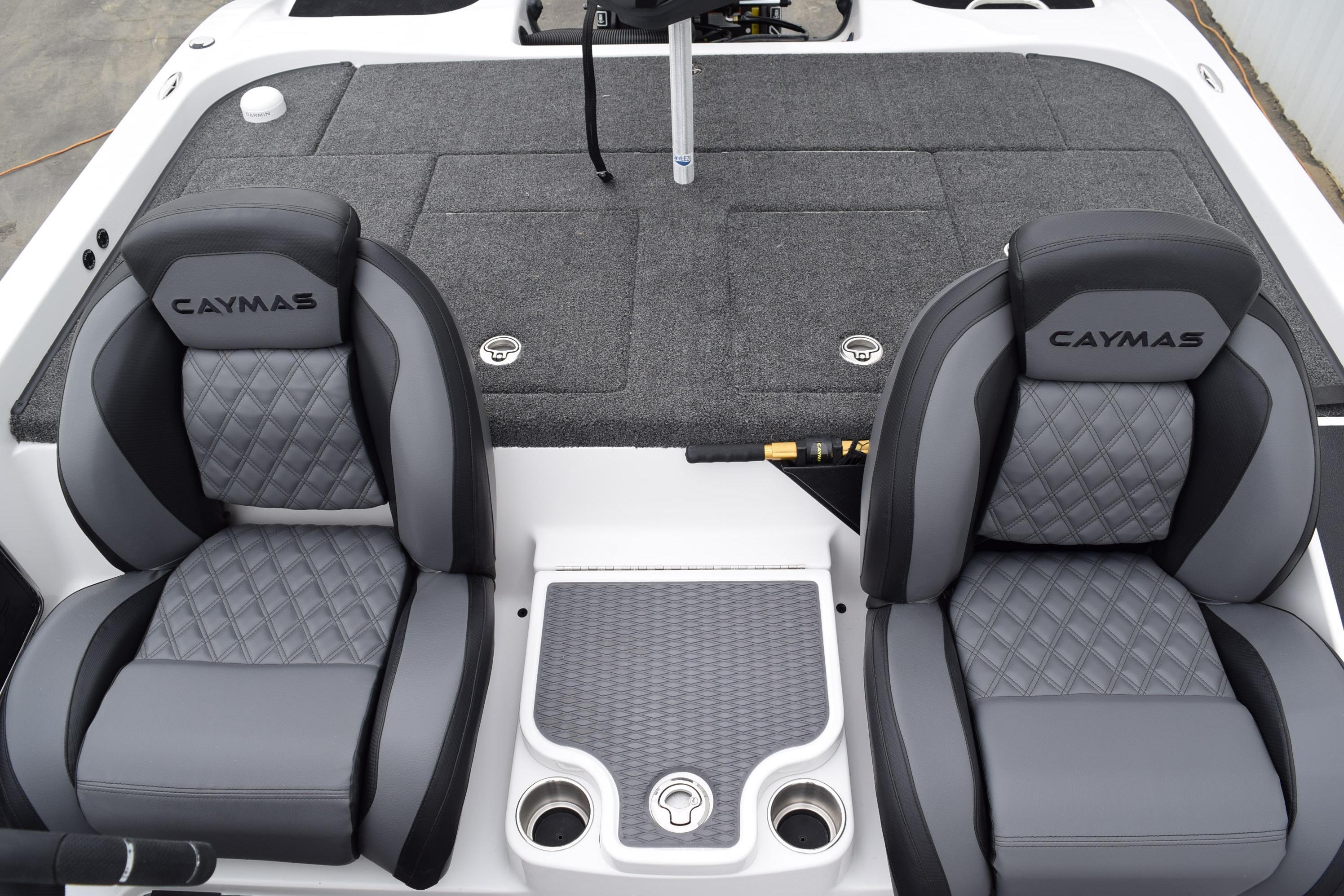 Luxury seating on 2027 Caymas CX 20 Pro boat, featuring quilted gray upholstery.