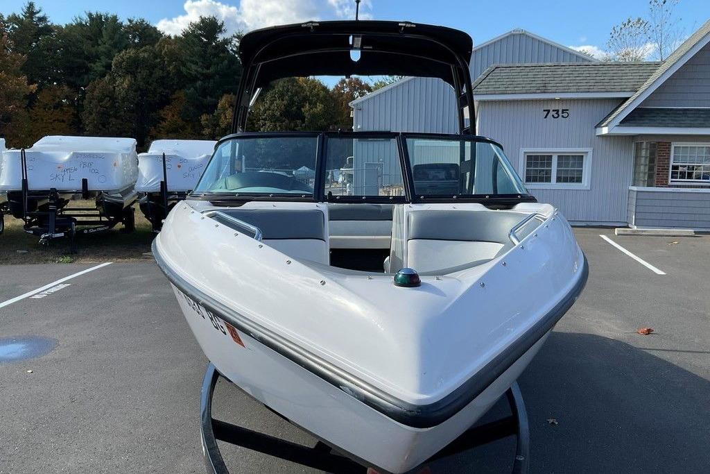 2015 Moomba Outback V boat parked in a lot, front view.