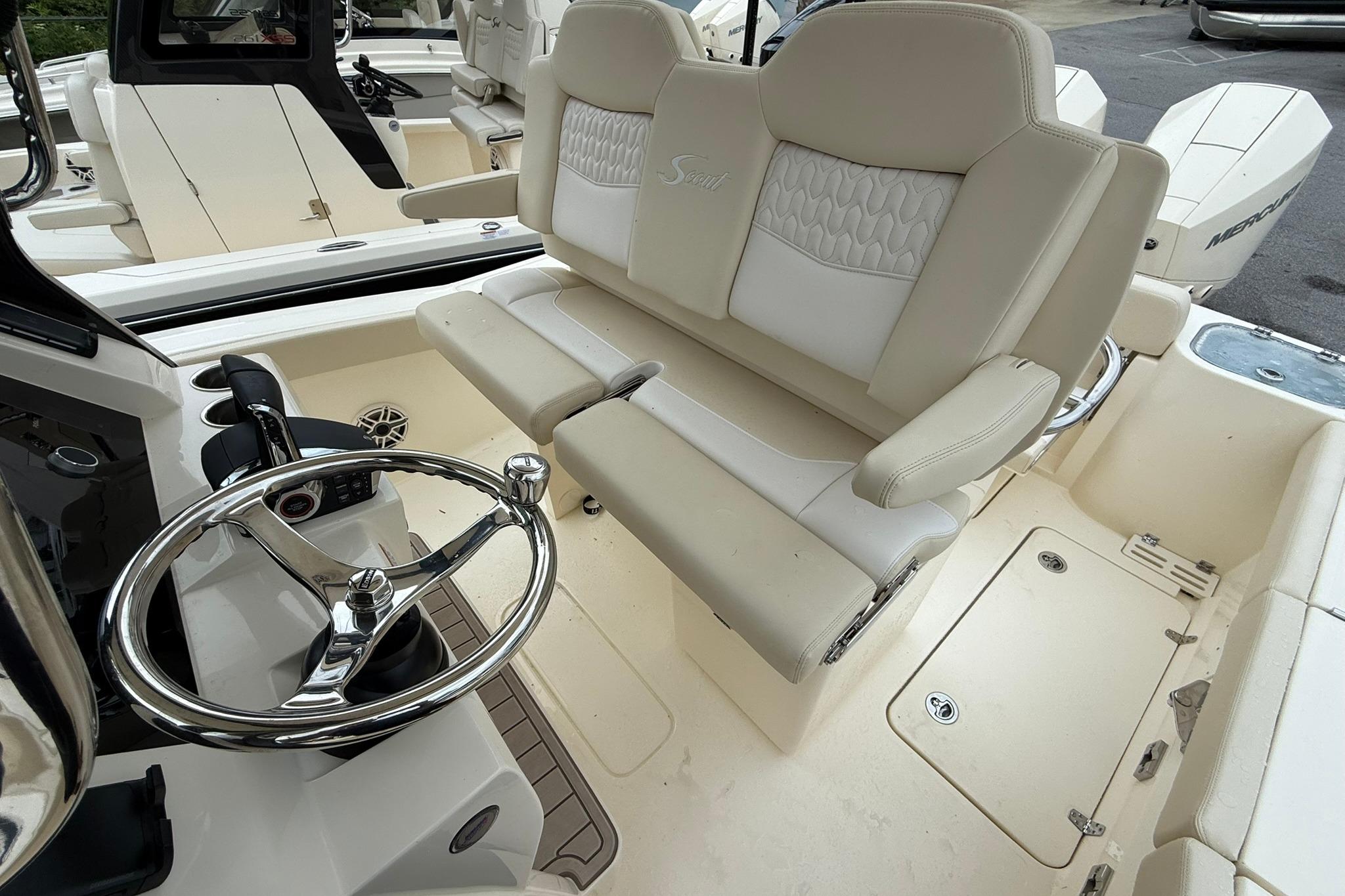 2026 Scout 260 LXF boat interior with luxurious seating and modern steering wheel.